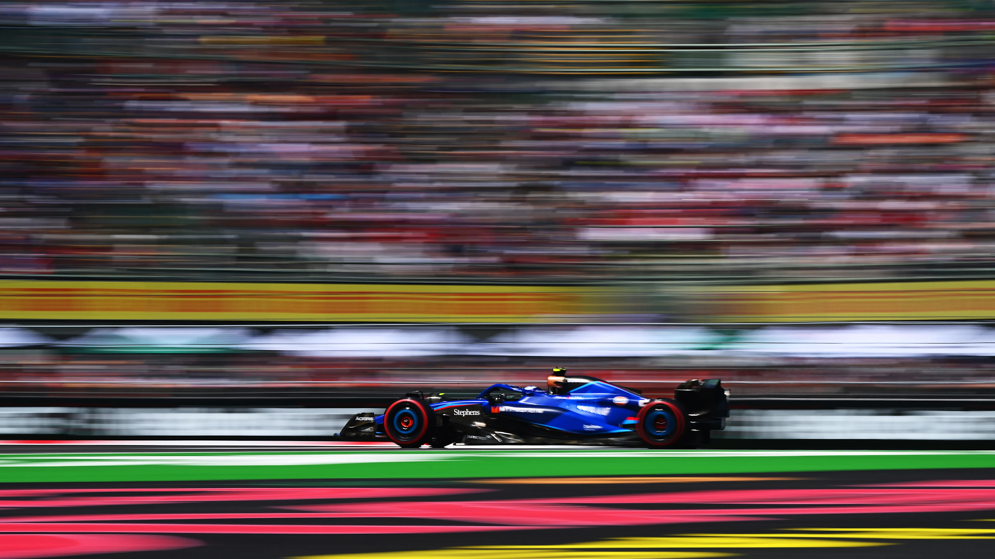 MEXICO CITY, MEXICO - OCTOBER 28: Logan Sargeant of United States driving the (2) Williams FW45