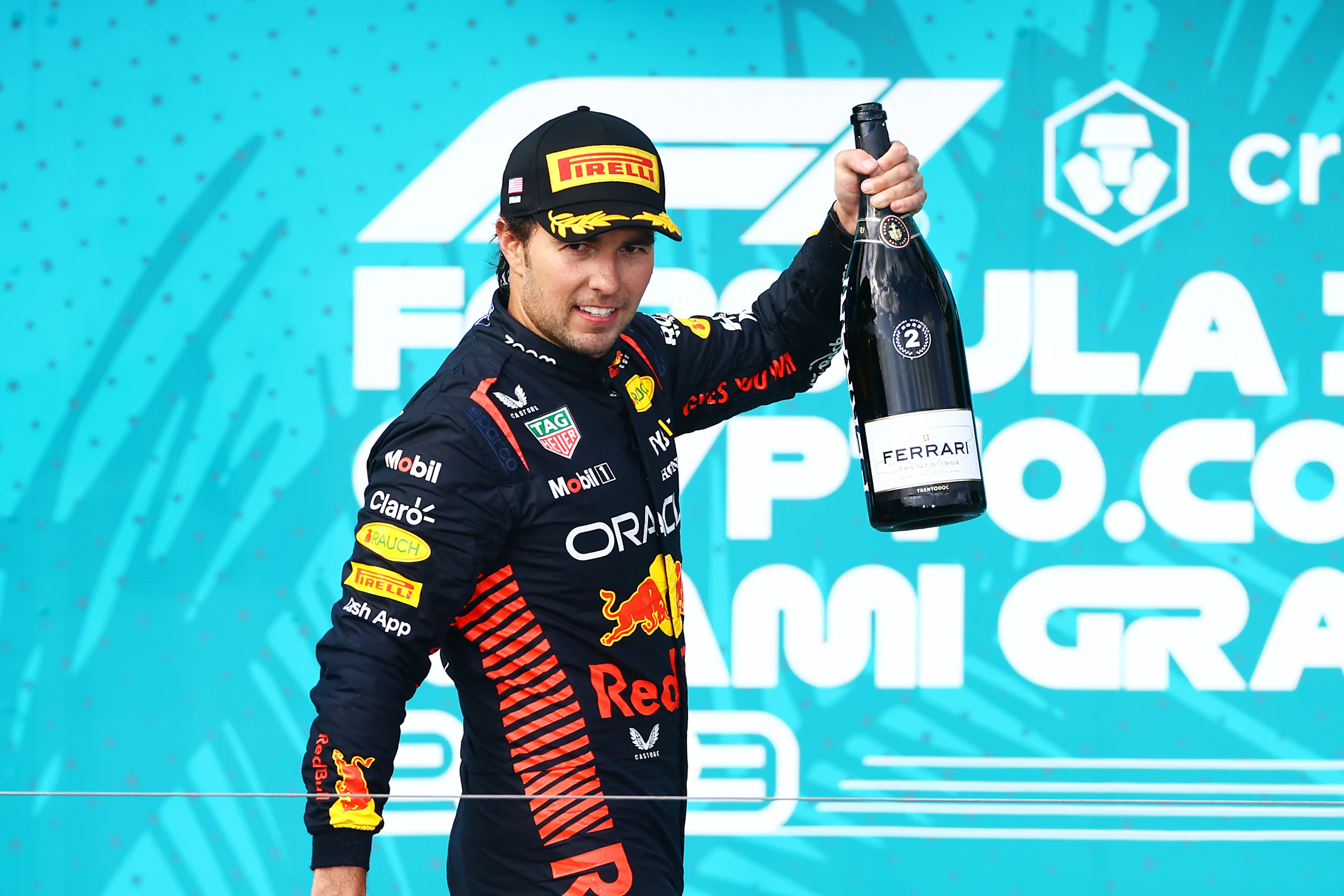 MIAMI, FLORIDA - MAY 07: Second placed Sergio Perez of Mexico and Oracle Red Bull Racing celebrates