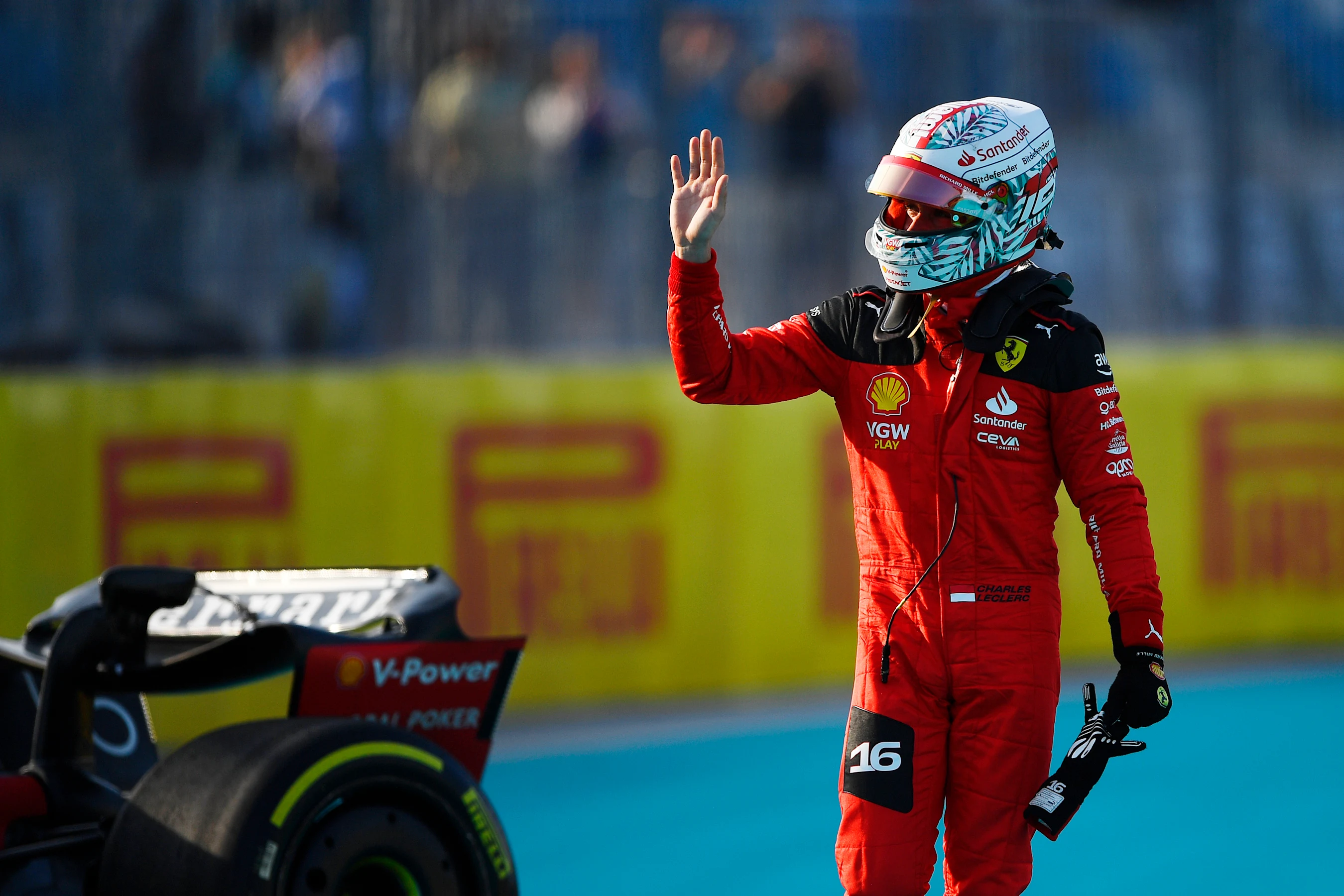 MIAMI, FLORIDA - MAY 05: Charles Leclerc of Monaco and Ferrari waves to the crowd after crashing