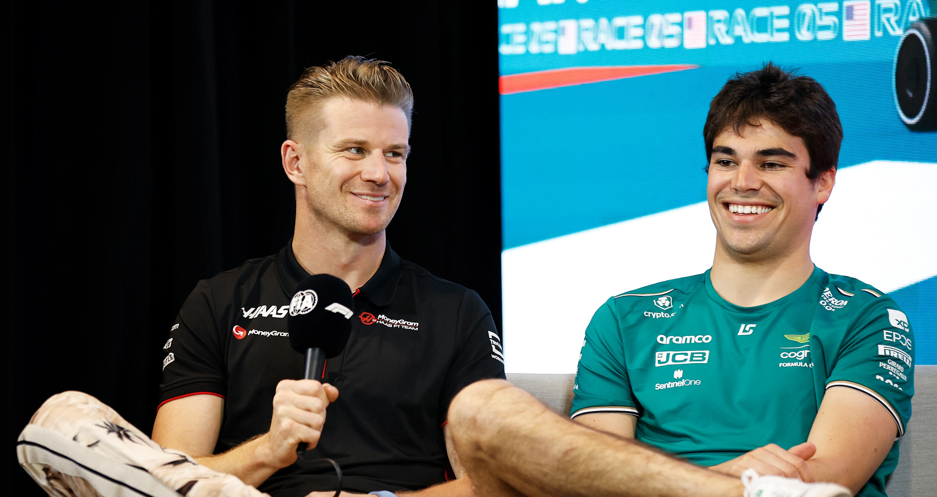 MIAMI, FLORIDA - MAY 04: Nico Hulkenberg of Germany and Haas F1 and Lance Stroll of Canada and