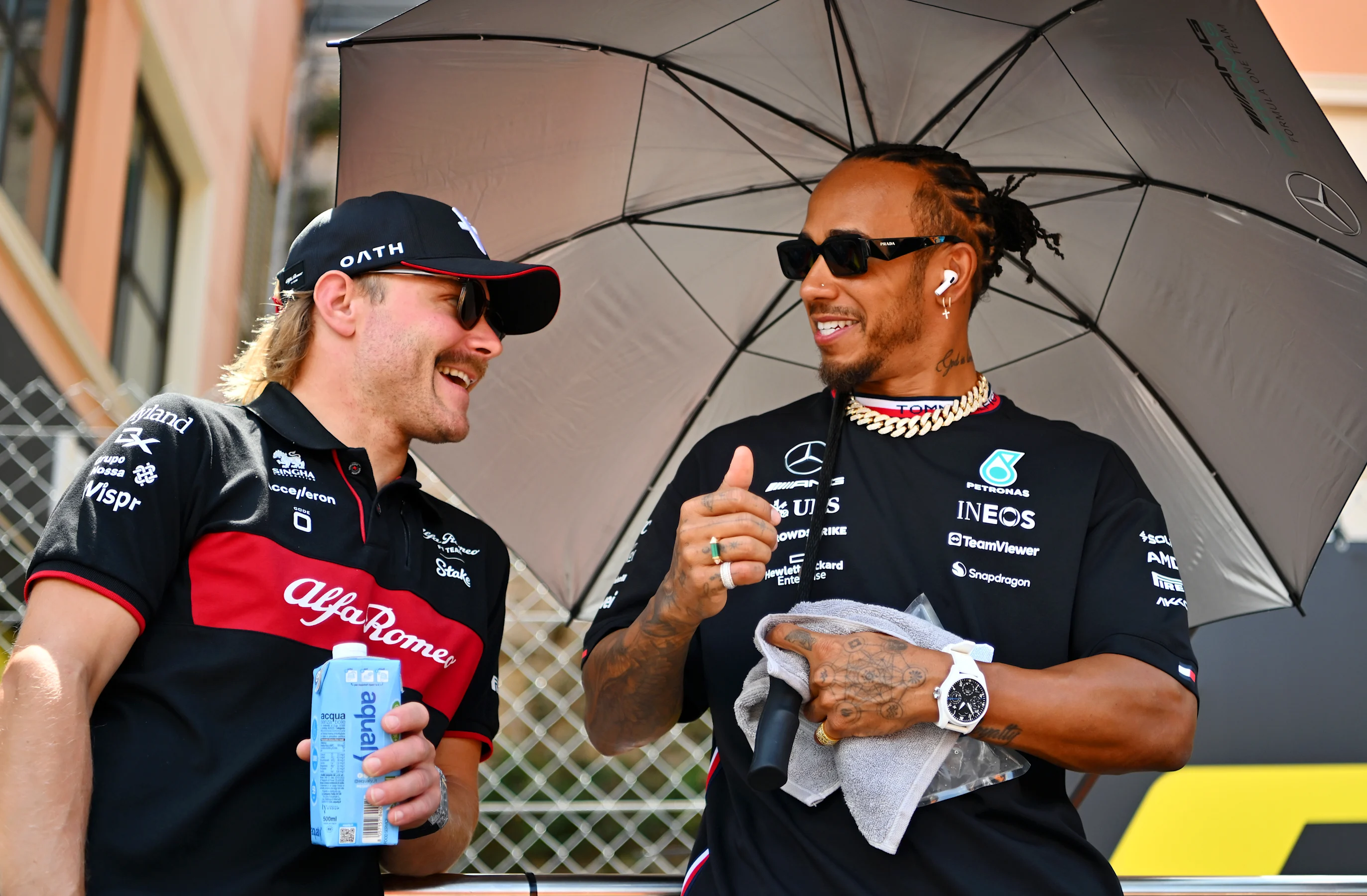 MONTE-CARLO, MONACO - MAY 28: Lewis Hamilton of Great Britain and Mercedes talks with Valtteri
