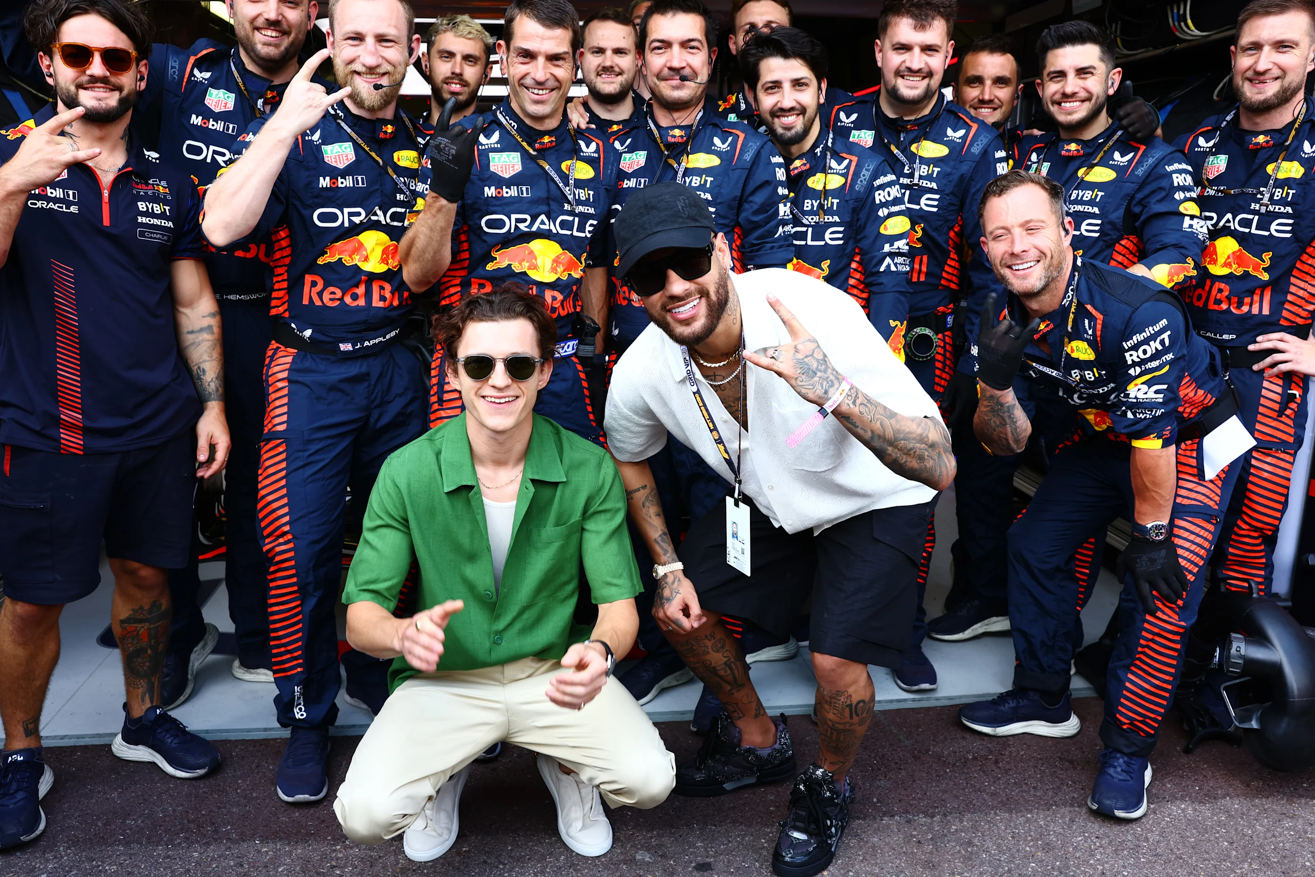 MONTE-CARLO, MONACO - MAY 28: Tom Holland and Neymar pose for a photo with the Red Bull Racing team