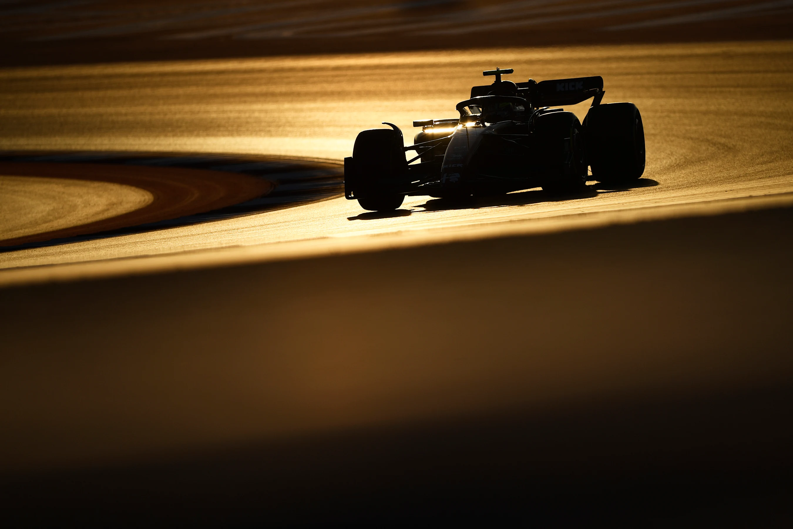 LUSAIL CITY, QATAR - OCTOBER 07: Zhou Guanyu of China driving the (24) Alfa Romeo F1 C43 Ferrari on