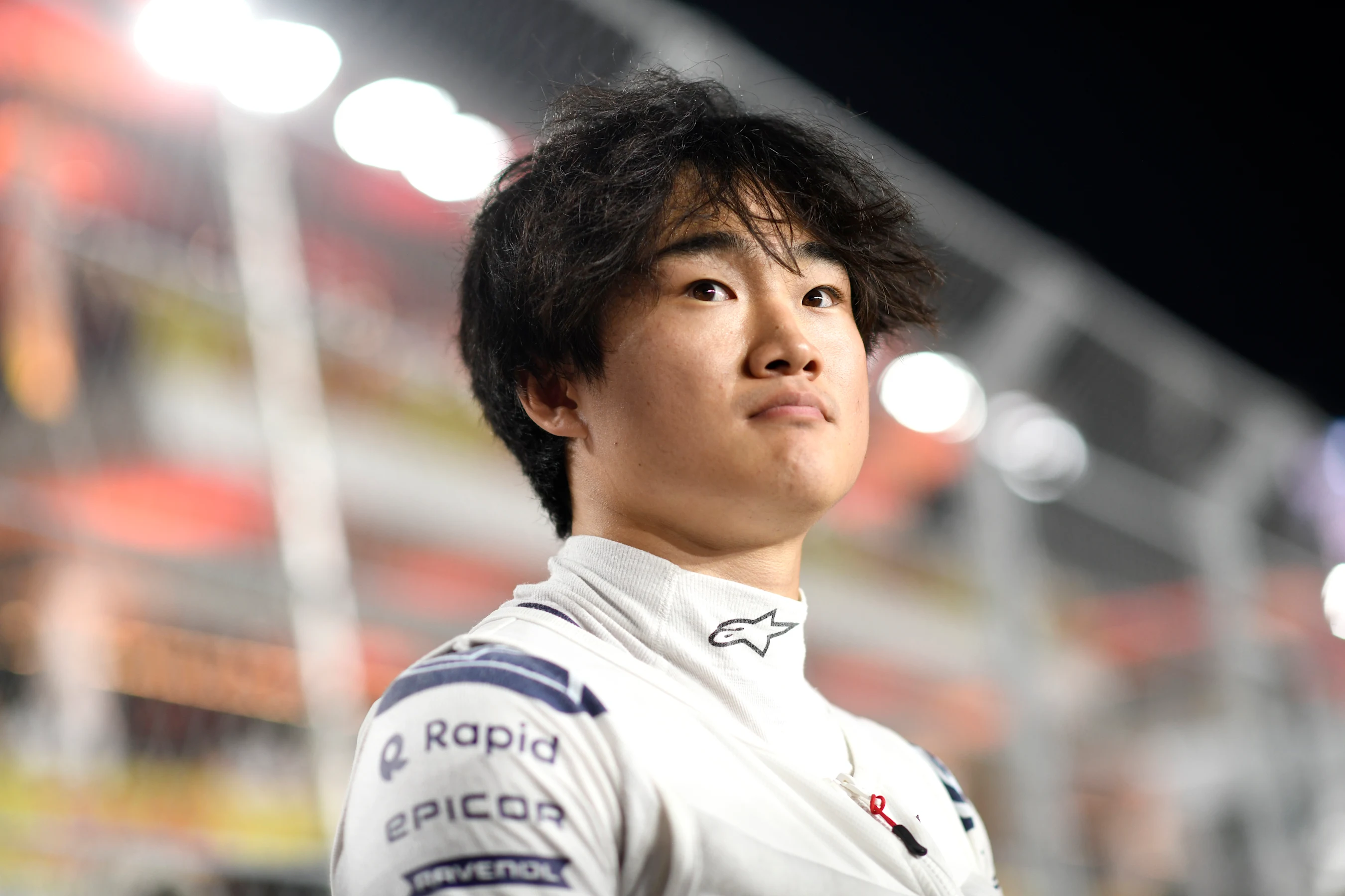 LUSAIL CITY, QATAR - OCTOBER 07: Yuki Tsunoda of Japan and Scuderia AlphaTauri looks on from the