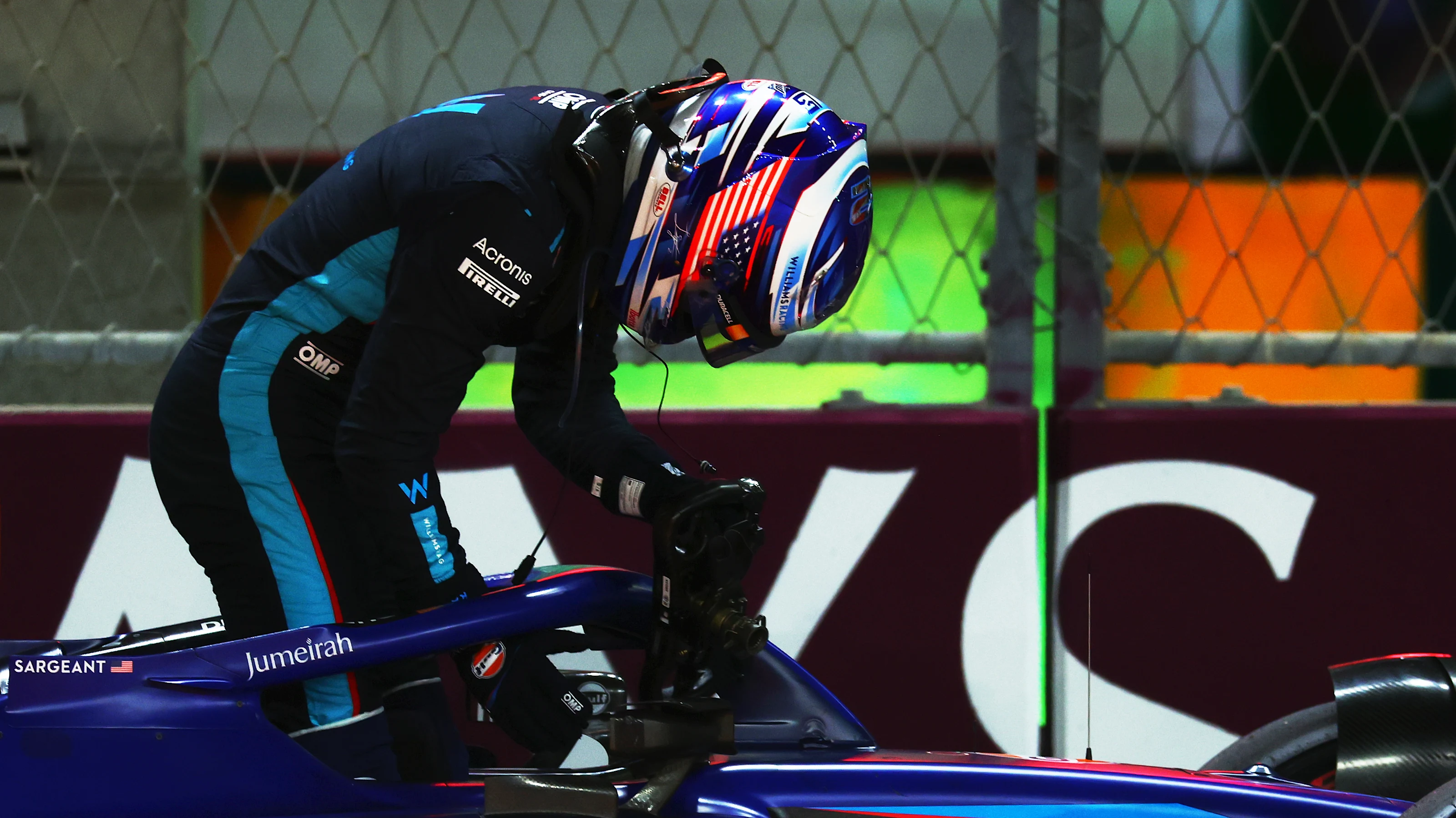 JEDDAH, SAUDI ARABIA - MARCH 18: Logan Sargeant of United States and Williams climbs from his car