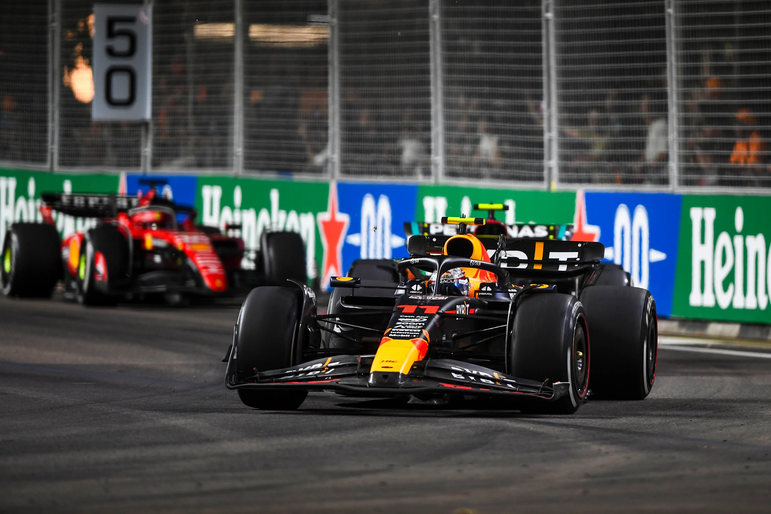 SINGAPORE, SINGAPORE - SEPTEMBER 17: Sergio Perez of Mexico driving the (11) Oracle Red Bull Racing