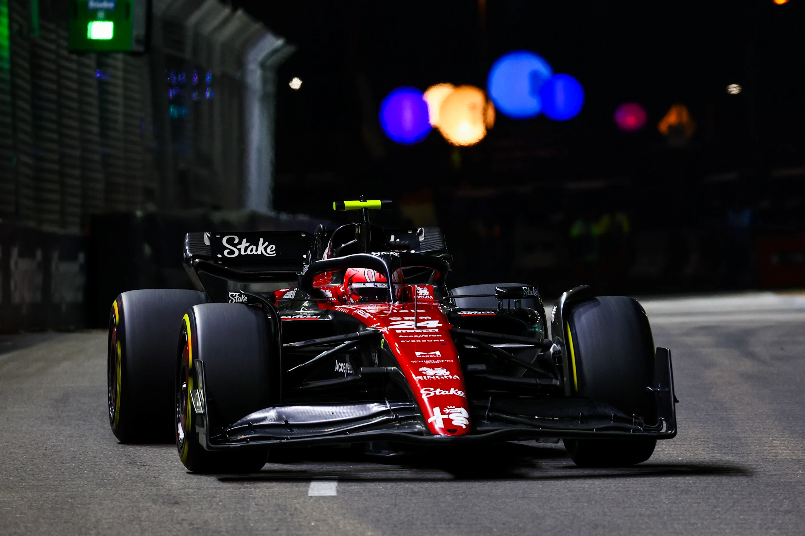 SINGAPORE, SINGAPORE - SEPTEMBER 17: Zhou Guanyu of China driving the (24) Alfa Romeo F1 C43
