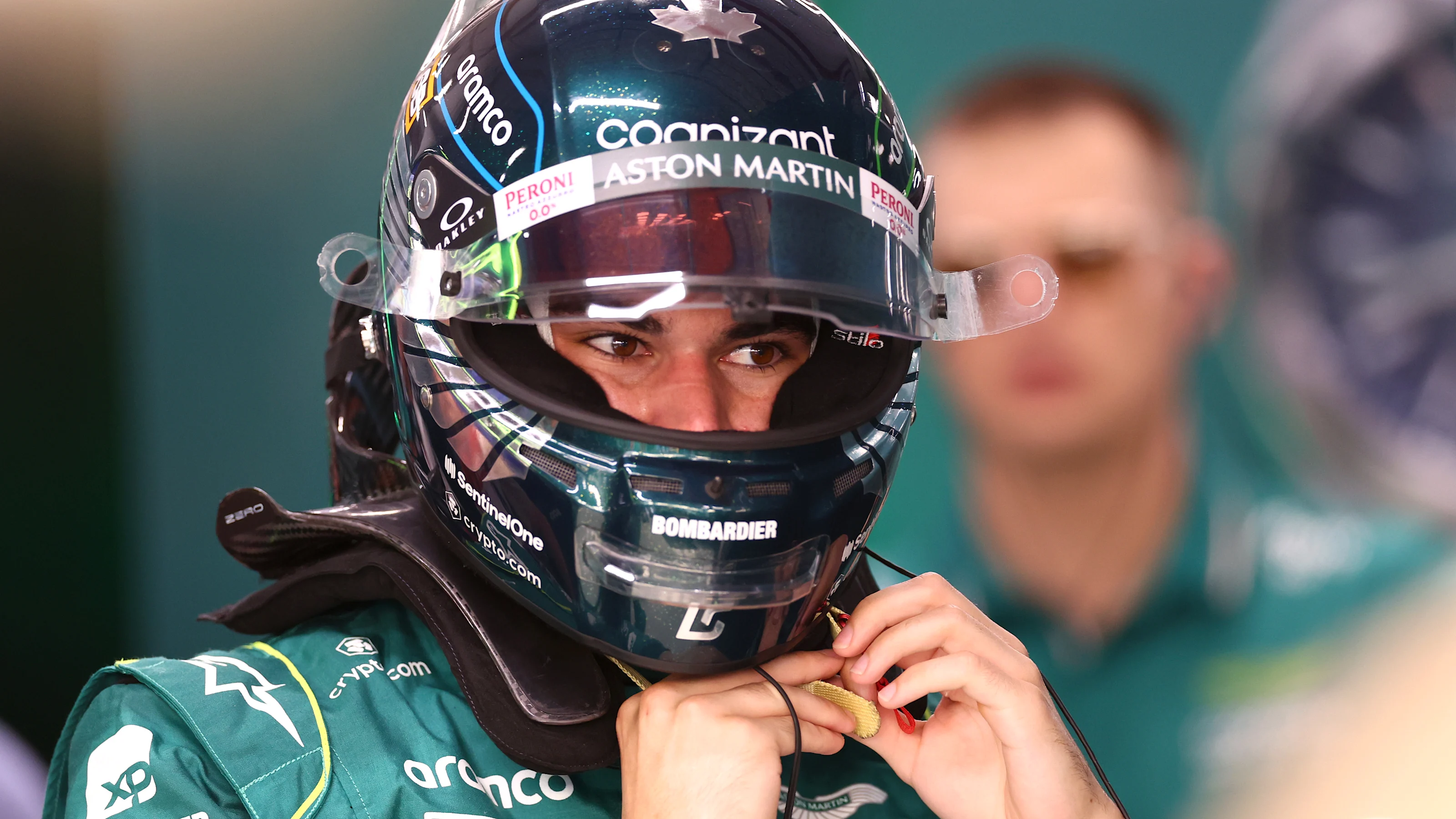 SINGAPORE, SINGAPORE - SEPTEMBER 15: Lance Stroll of Canada and Aston Martin F1 Team prepares to