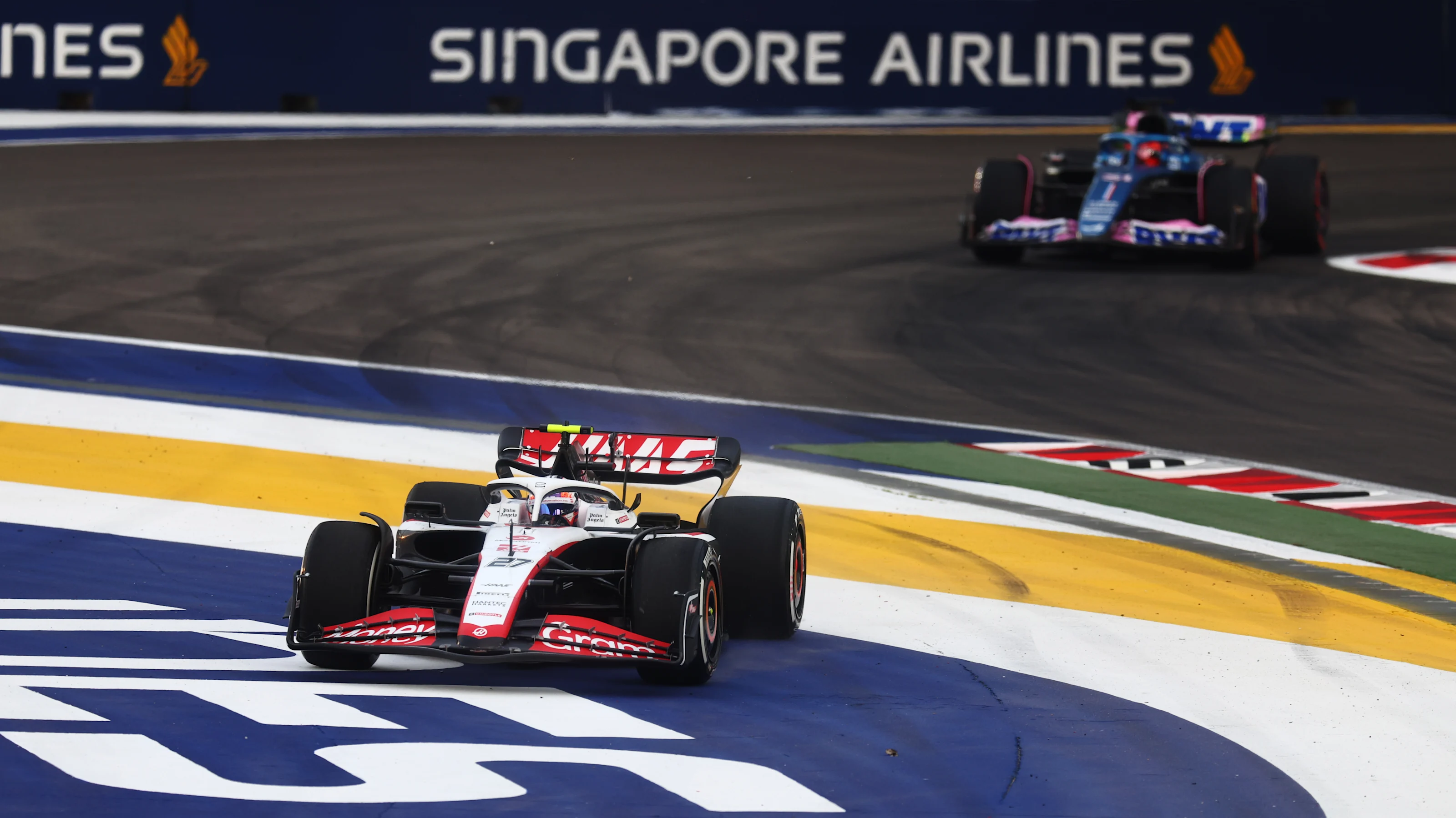 SINGAPORE, SINGAPORE - SEPTEMBER 15: Nico Hulkenberg of Germany driving the (27) Haas F1 VF-23