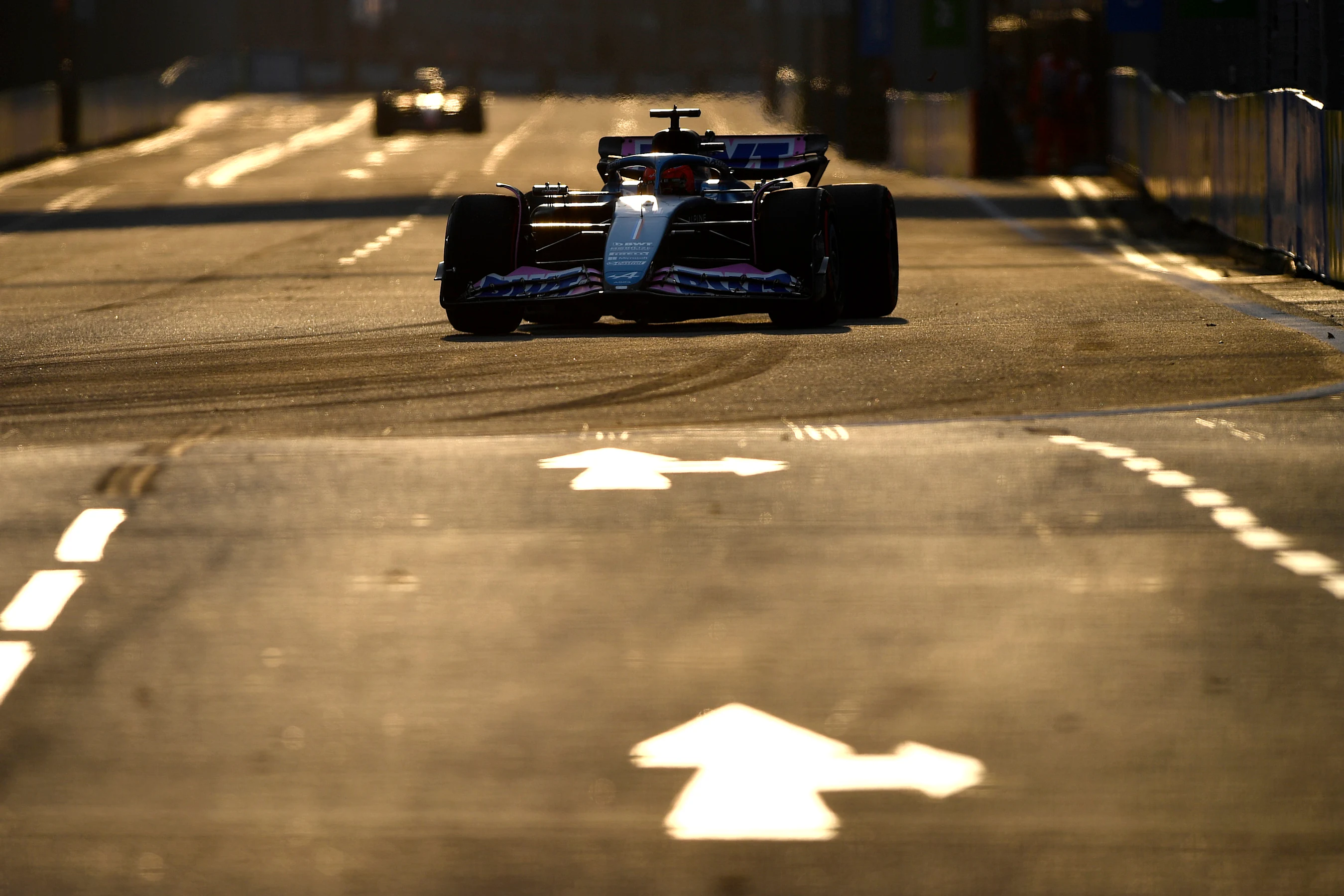 SINGAPORE, SINGAPORE - SEPTEMBER 15: Esteban Ocon of France driving the (31) Alpine F1 A523 Renault
