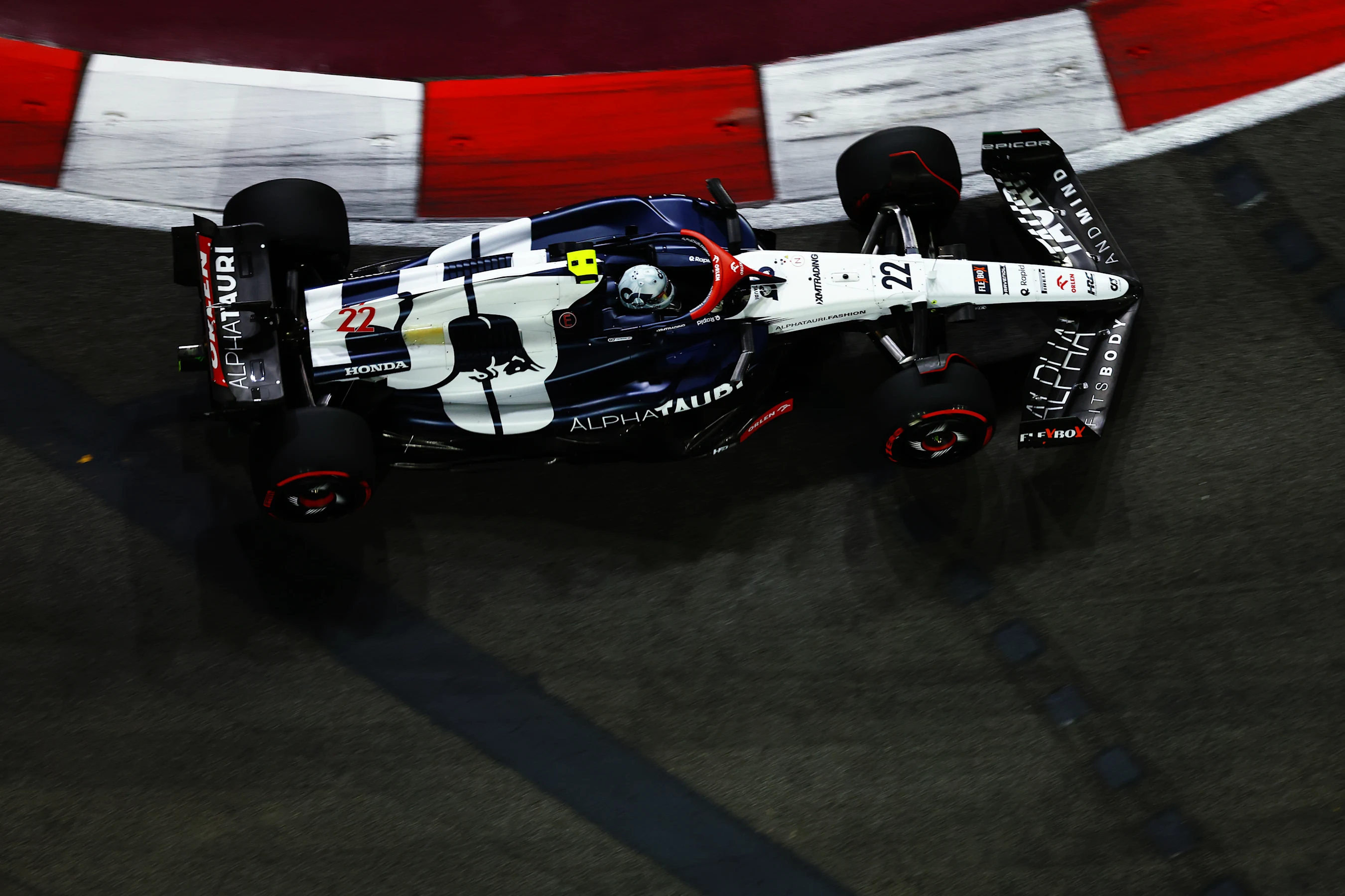 SINGAPORE, SINGAPORE - SEPTEMBER 15: Yuki Tsunoda of Japan driving the (22) Scuderia AlphaTauri