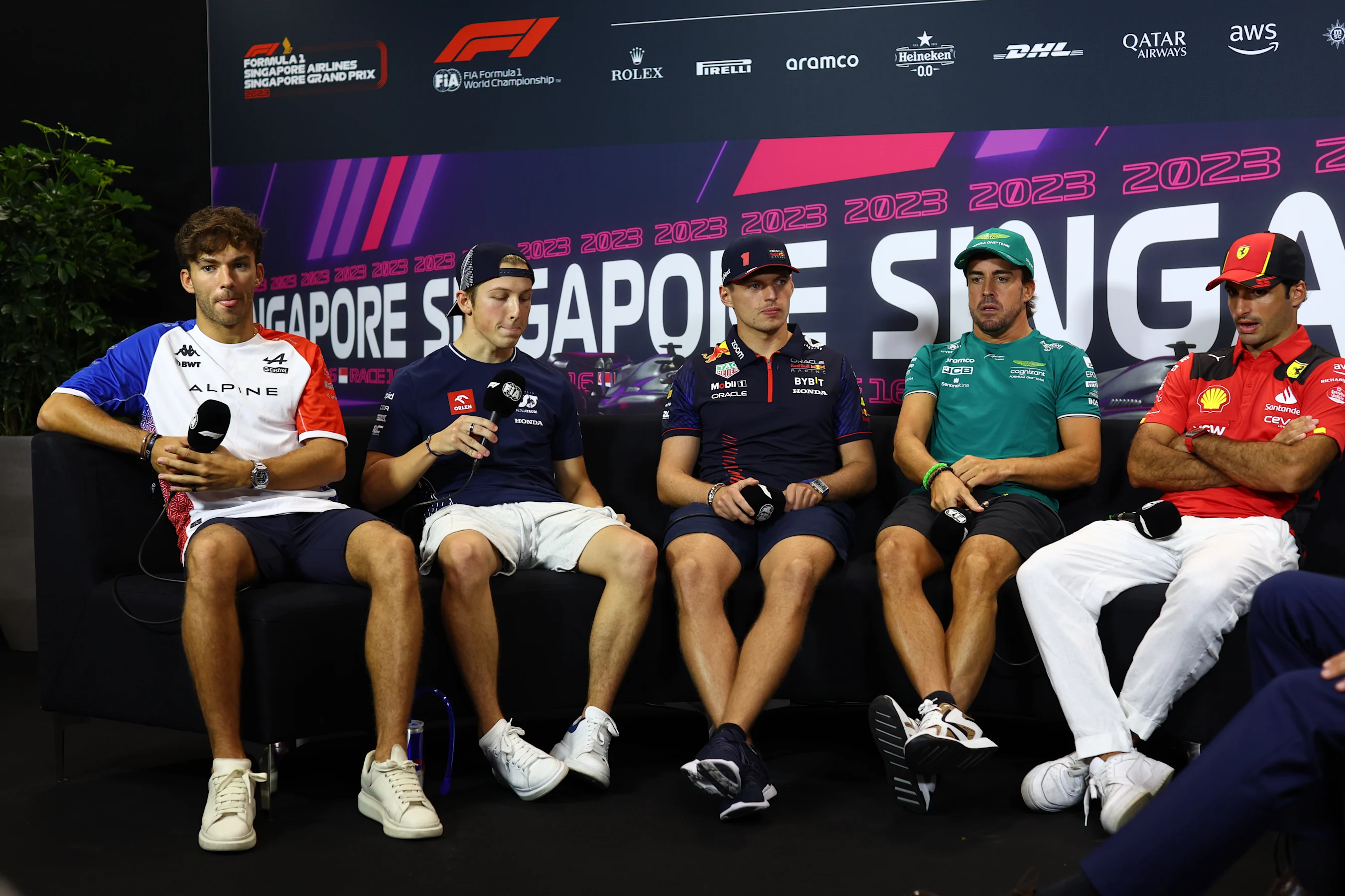 SINGAPORE, SINGAPORE - SEPTEMBER 14: Pierre Gasly of France and Alpine F1, Liam Lawson of New