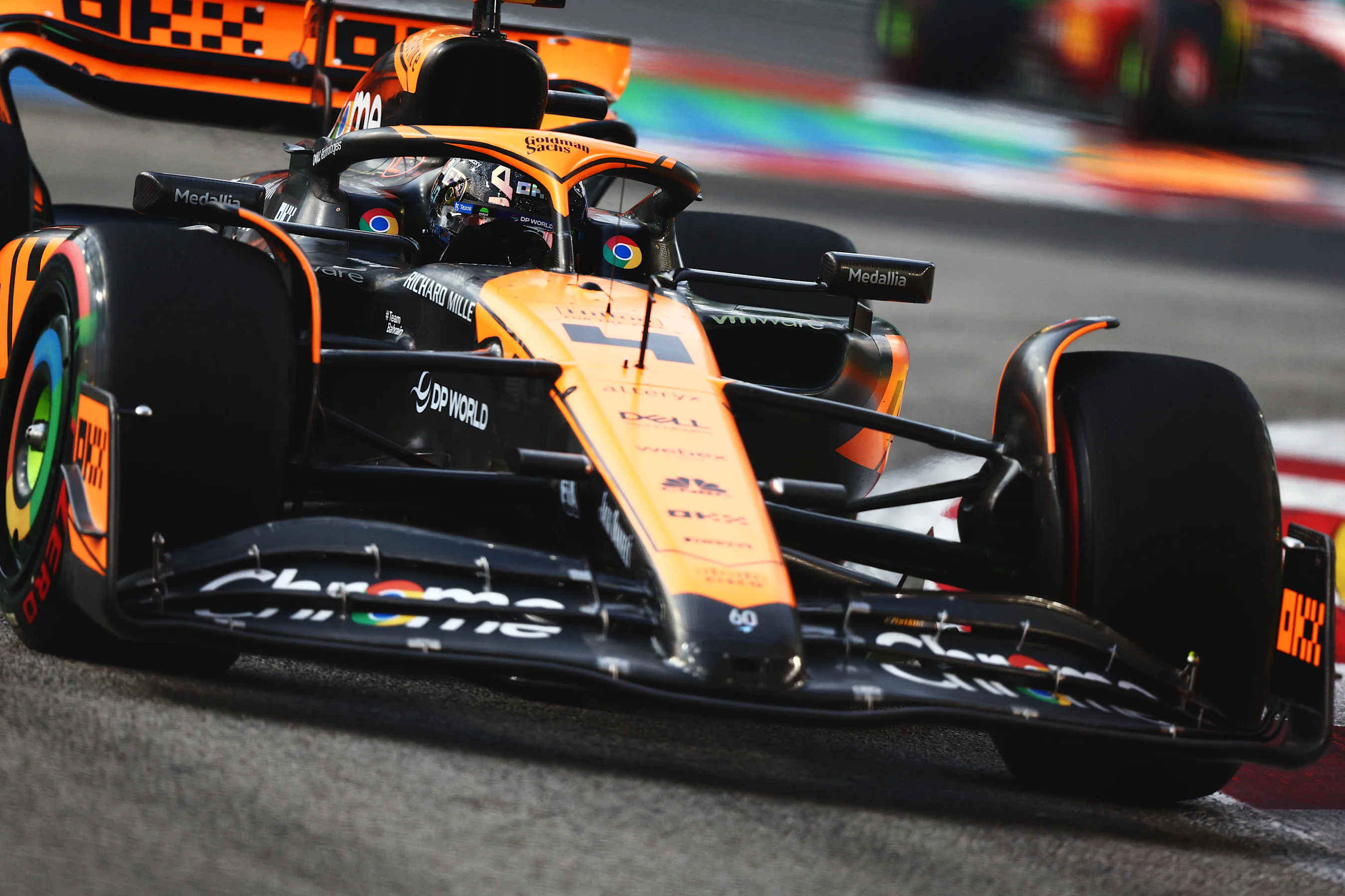 SINGAPORE, SINGAPORE - SEPTEMBER 16: Lando Norris of Great Britain driving the (4) McLaren MCL60