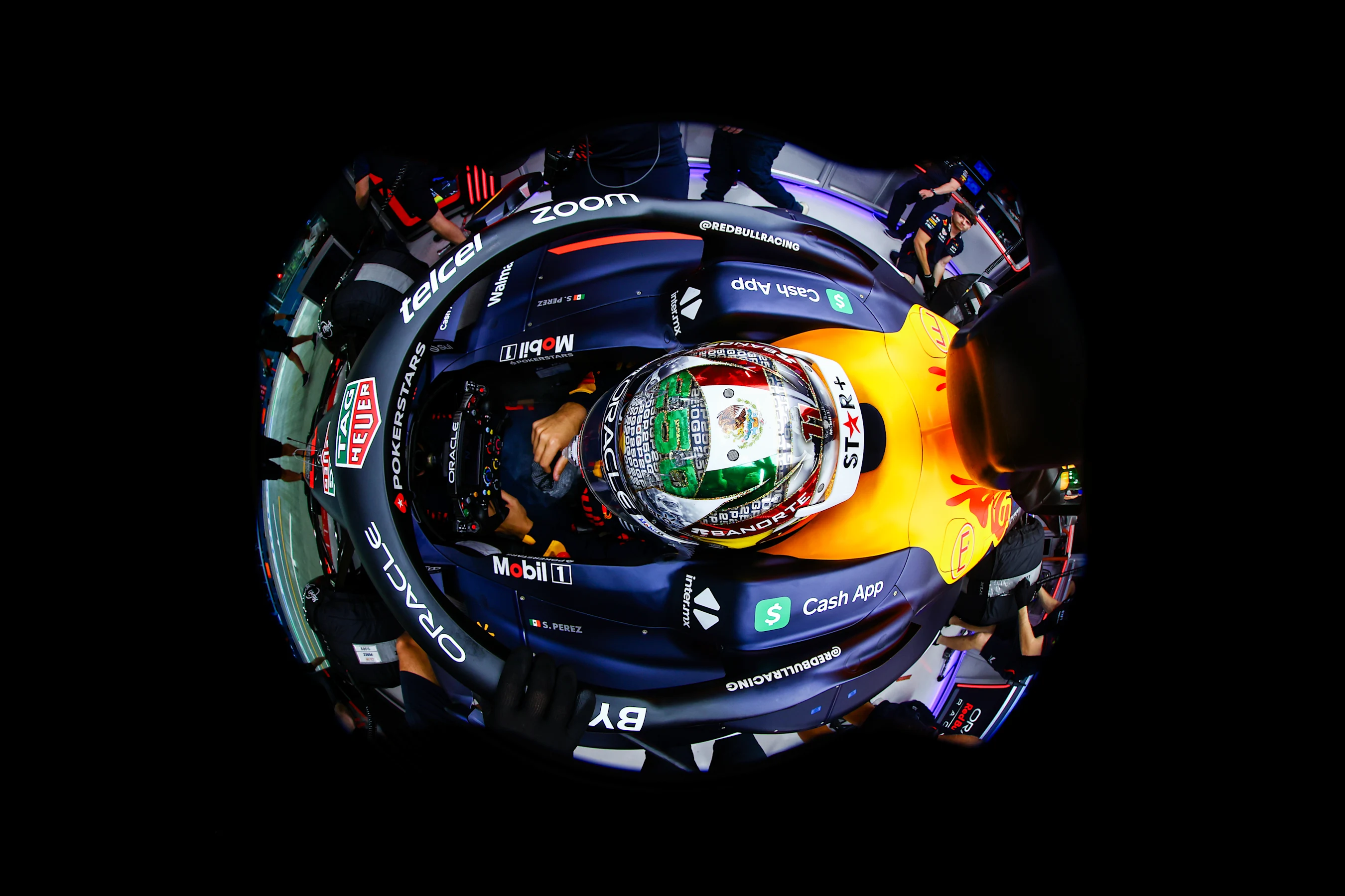 SINGAPORE, SINGAPORE - SEPTEMBER 16: Sergio Perez of Mexico and Oracle Red Bull Racing prepares to