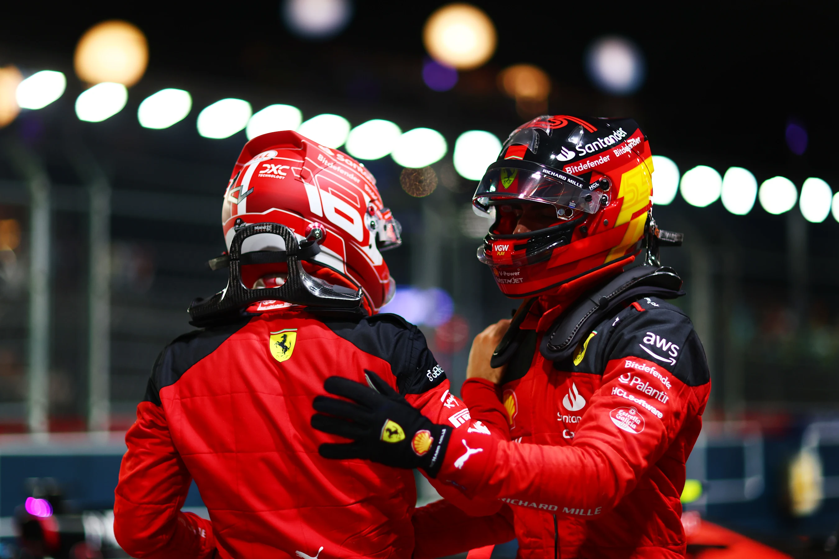 SINGAPORE, SINGAPORE - SEPTEMBER 16: Pole position qualifier Carlos Sainz of Spain and Ferrari