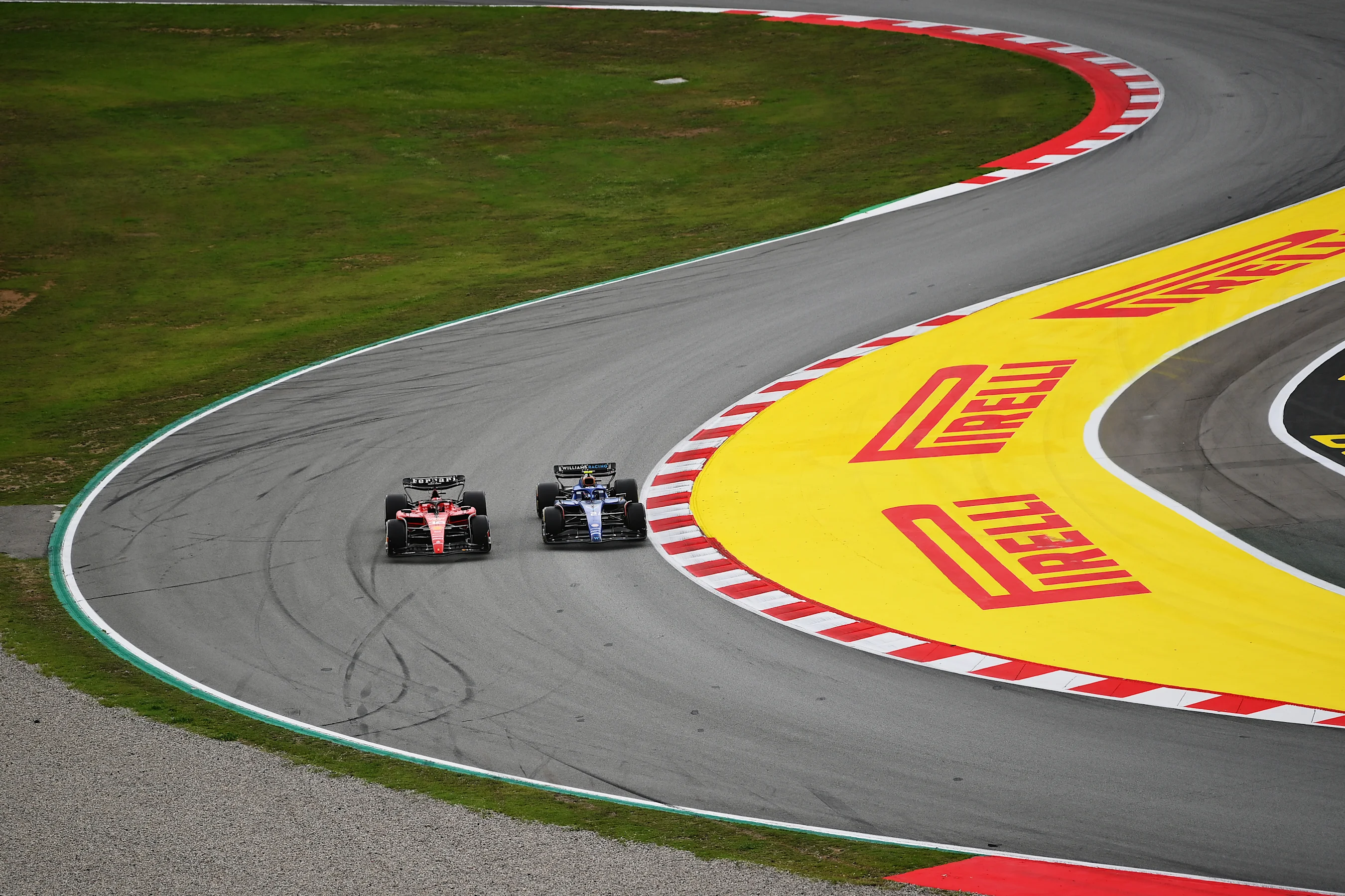 BARCELONA, SPAIN - JUNE 04: Charles Leclerc of Monaco driving the (16) Ferrari SF-23 leads Logan
