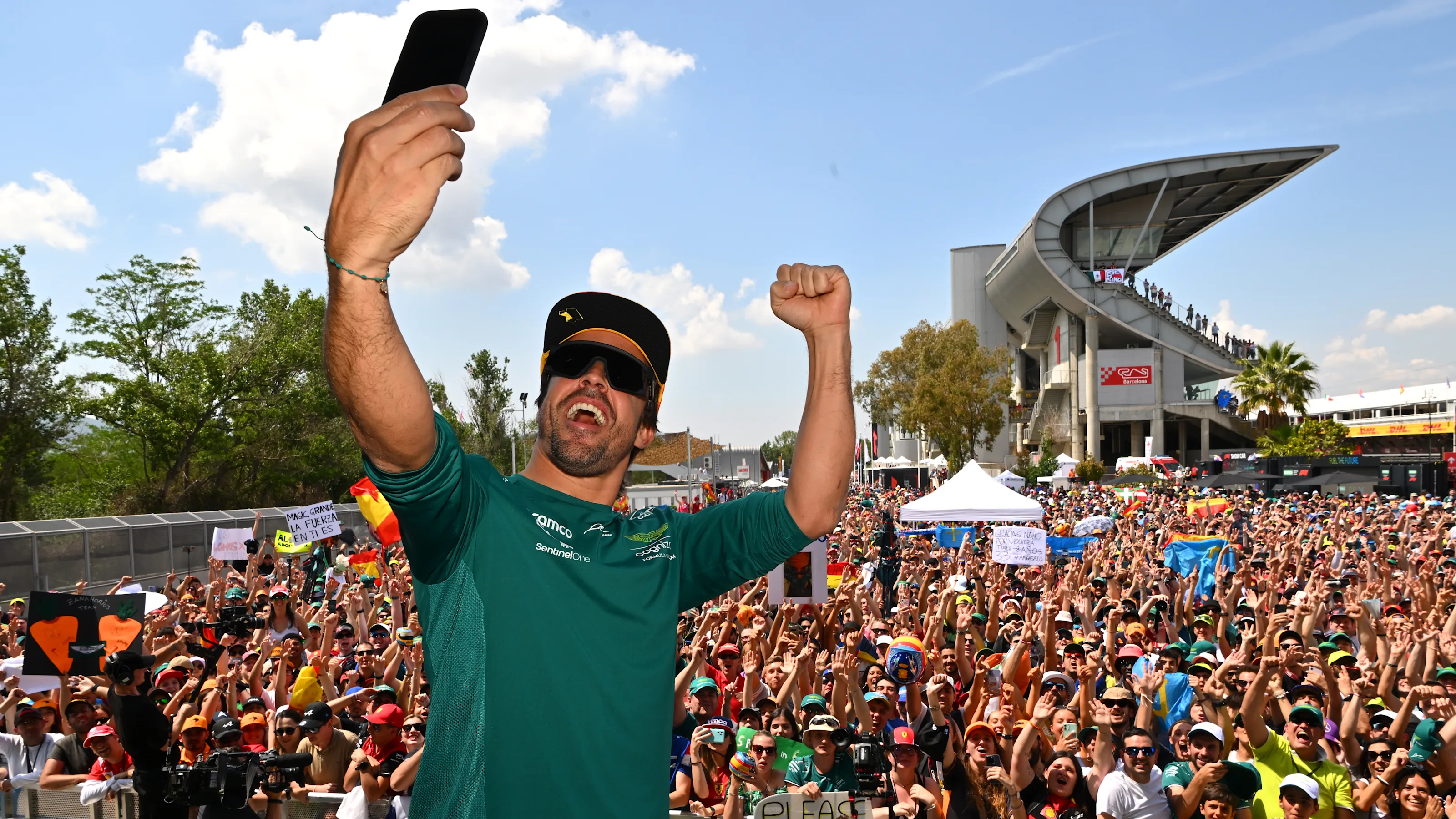 BARCELONA, SPAIN - JUNE 02: Fernando Alonso of Spain and Aston Martin F1 Team takes a photo from