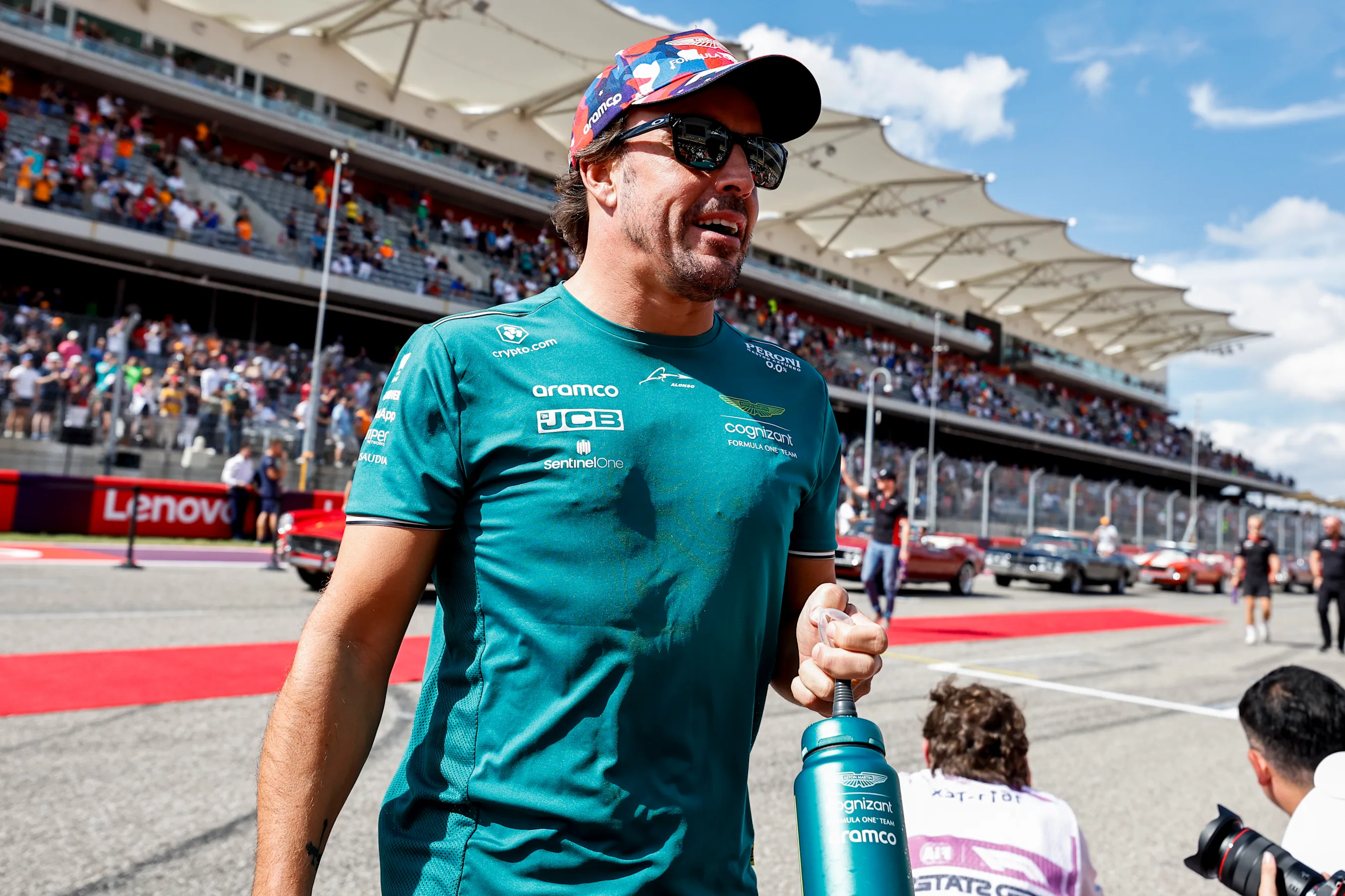 AUSTIN, TEXAS - OCTOBER 22: Fernando Alonso of Spain and Aston Martin F1 Team looks on from the