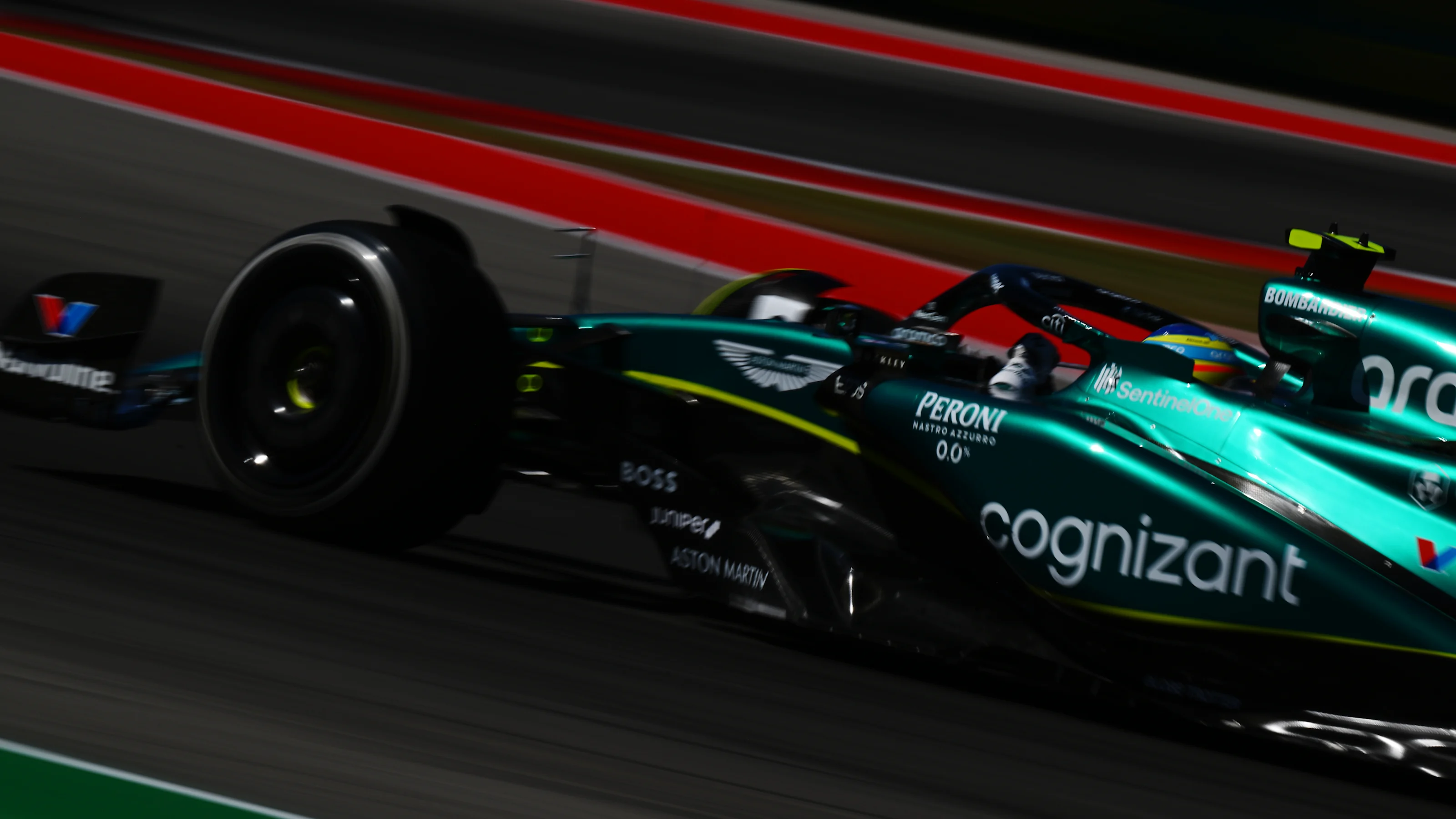 AUSTIN, TEXAS - OCTOBER 20: Fernando Alonso of Spain driving the (14) Aston Martin AMR23 Mercedes