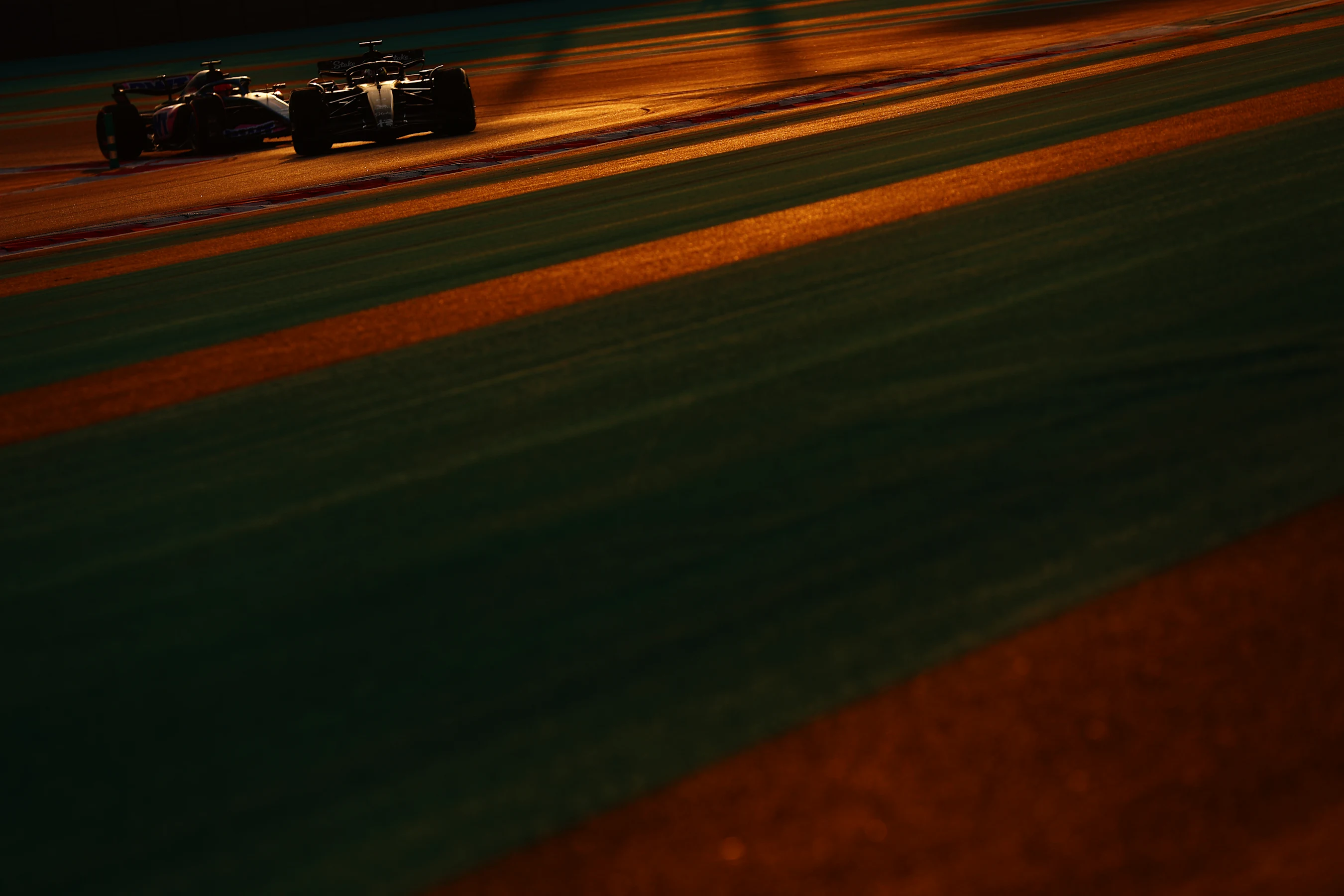 ABU DHABI, UNITED ARAB EMIRATES - NOVEMBER 28: Zhou Guanyu of China driving the (24) Alfa Romeo F1