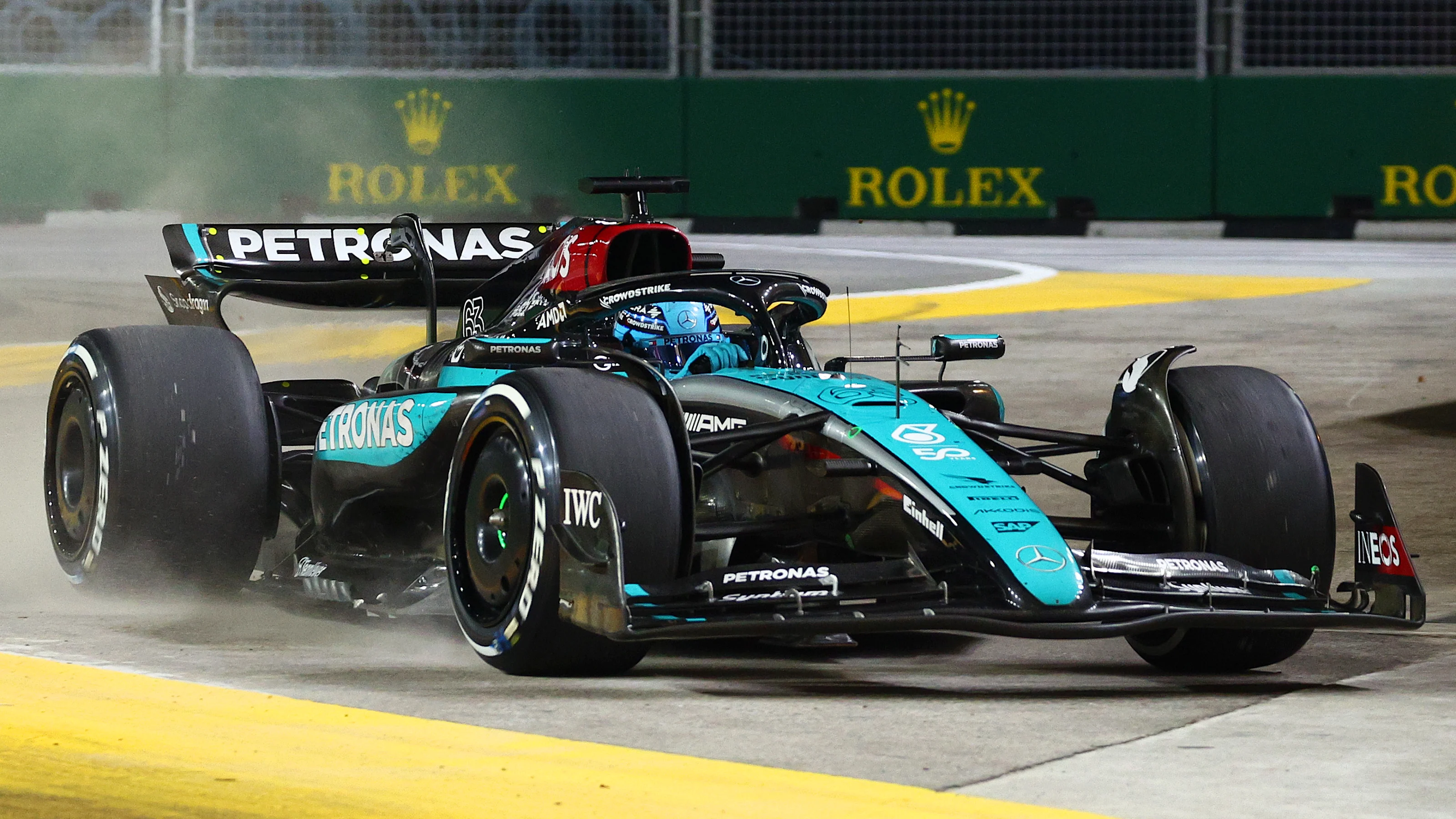 SINGAPORE, SINGAPORE - SEPTEMBER 22: George Russell of Great Britain driving the (63) Mercedes AMG