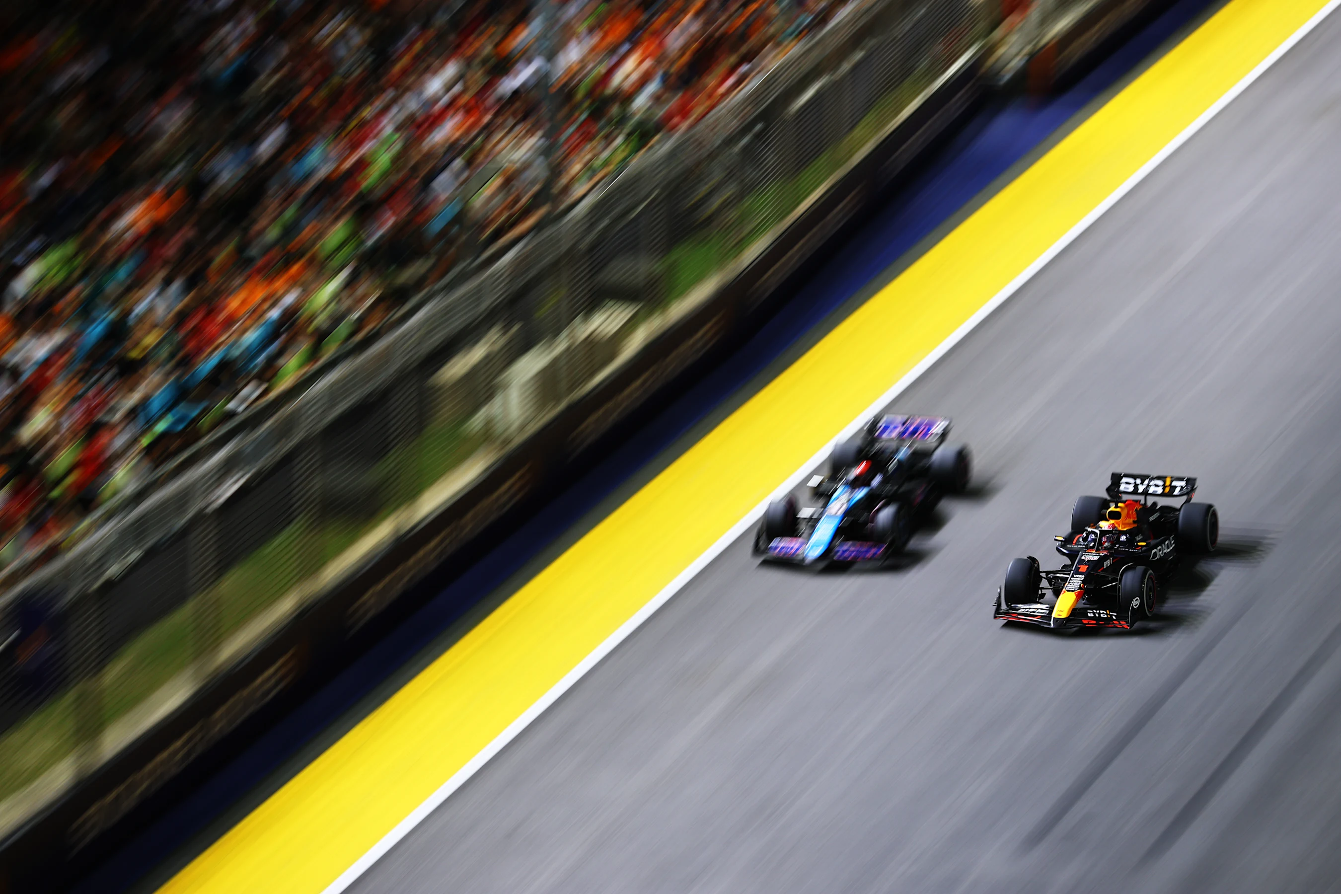 SINGAPORE, SINGAPORE - SEPTEMBER 22: Max Verstappen of the Netherlands driving the (1) Oracle Red