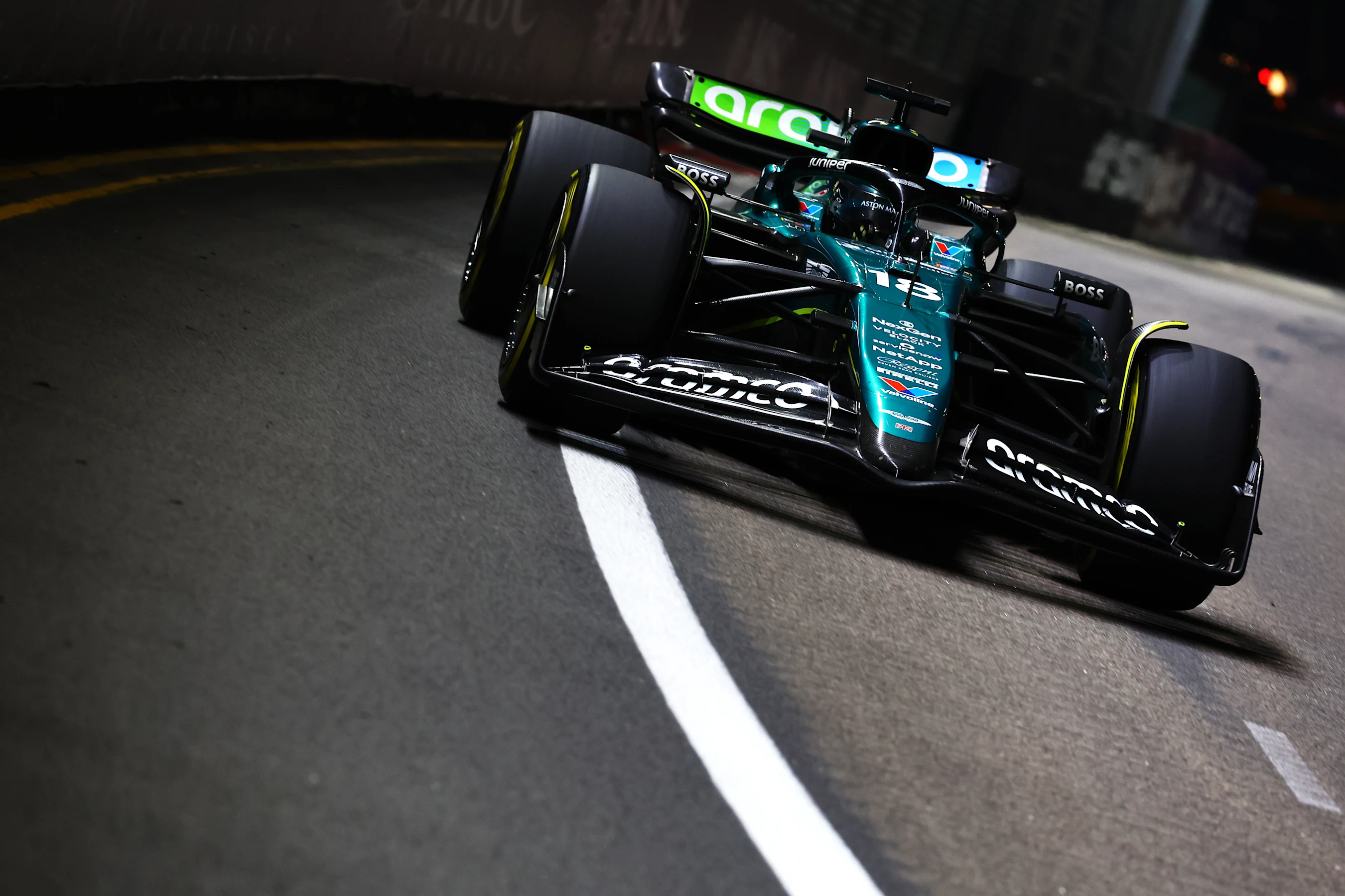 SINGAPORE, SINGAPORE - SEPTEMBER 22: Lance Stroll of Canada driving the (18) Aston Martin AMR24