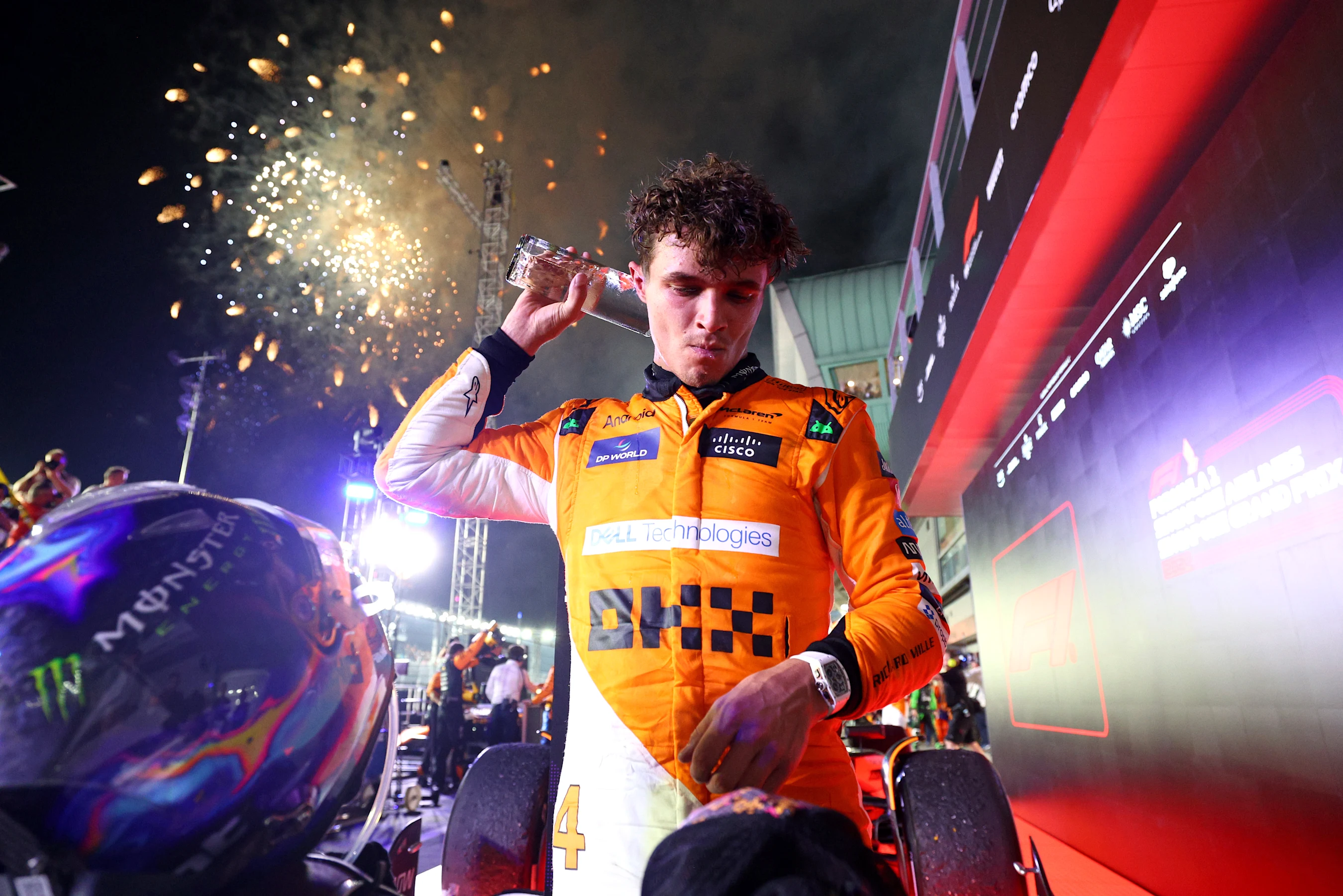SINGAPORE, SINGAPORE - SEPTEMBER 22: Race winner Lando Norris of Great Britain and McLaren in parc