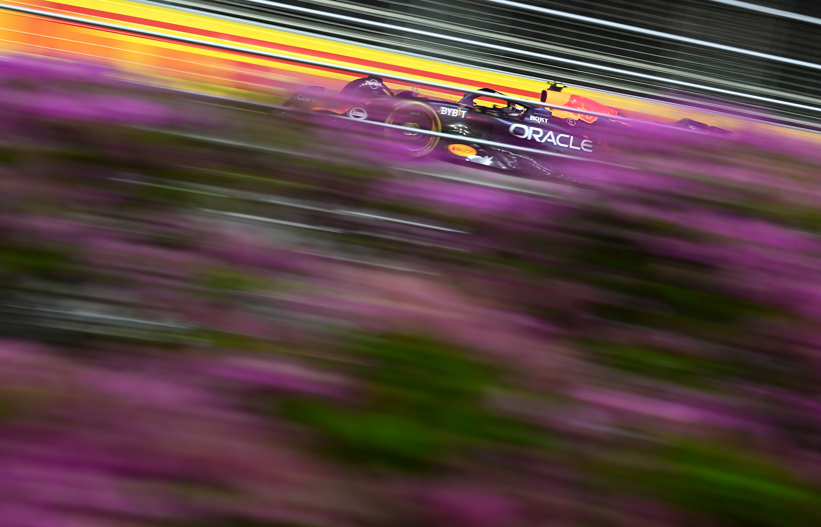 SINGAPORE, SINGAPORE - SEPTEMBER 22: Sergio Perez of Mexico driving the (11) Oracle Red Bull Racing