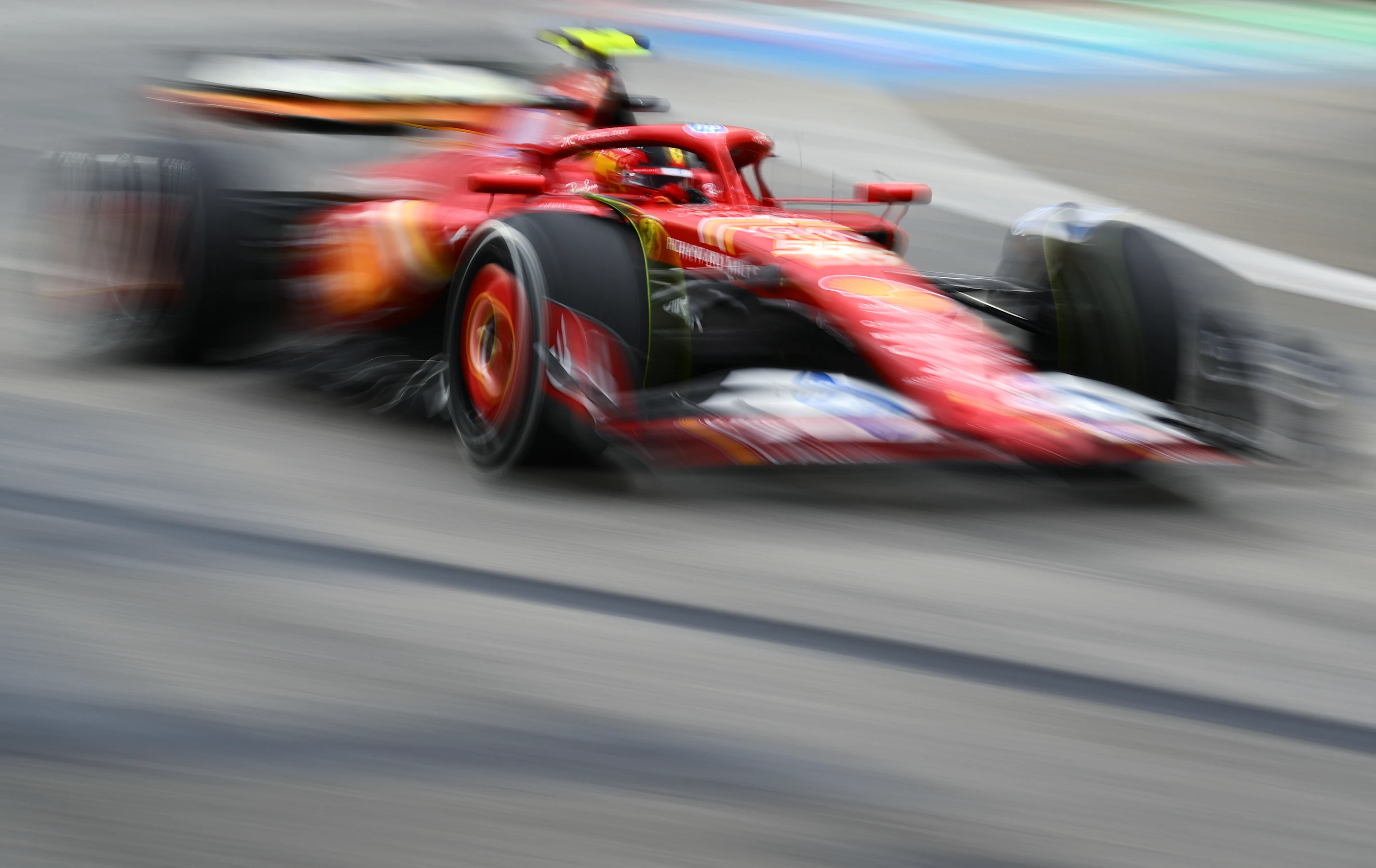 SINGAPORE, SINGAPORE - SEPTEMBER 20: Carlos Sainz of Spain driving (55) the Ferrari SF-24 on track