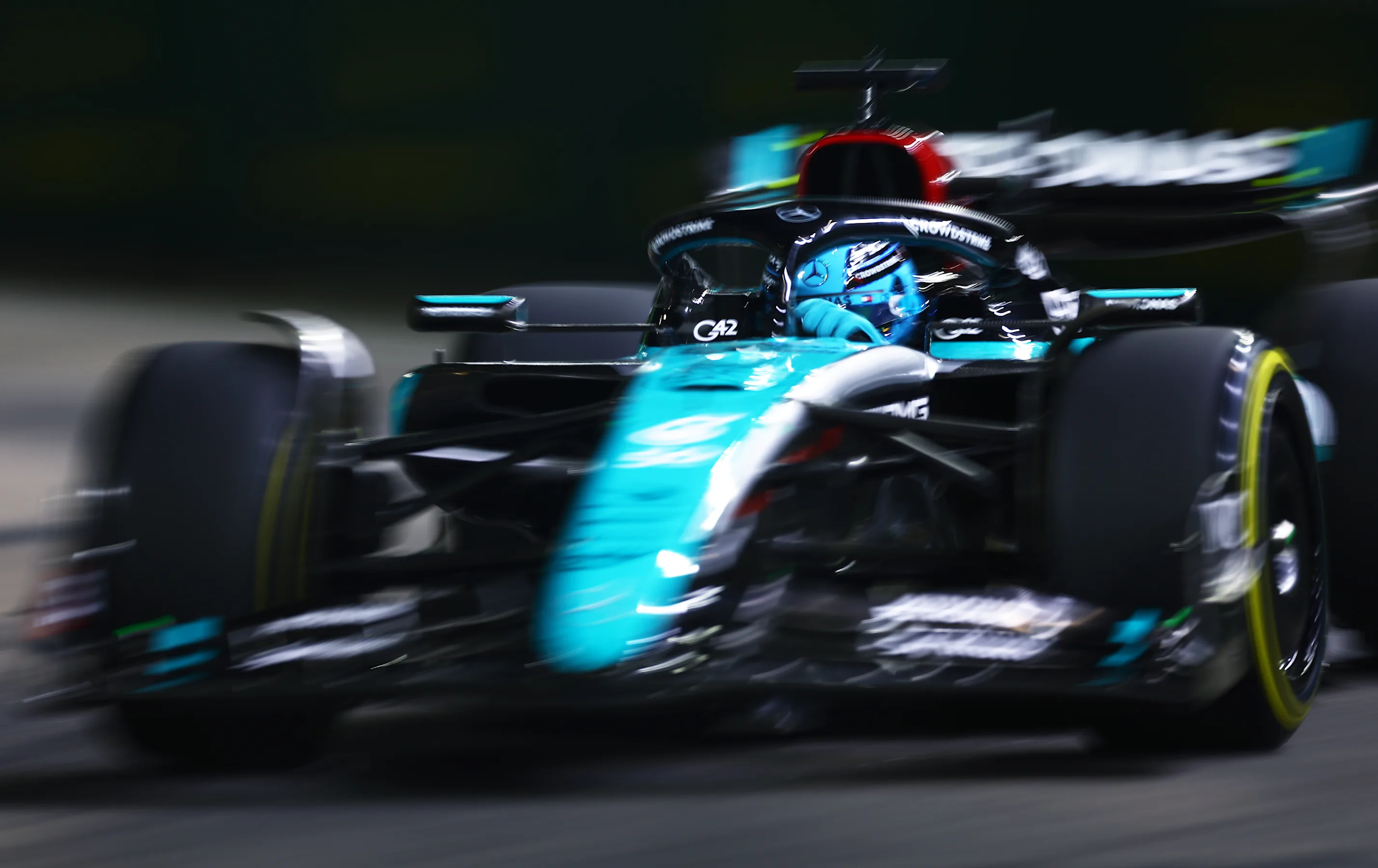 SINGAPORE, SINGAPORE - SEPTEMBER 20: George Russell of Great Britain driving the (63) Mercedes AMG