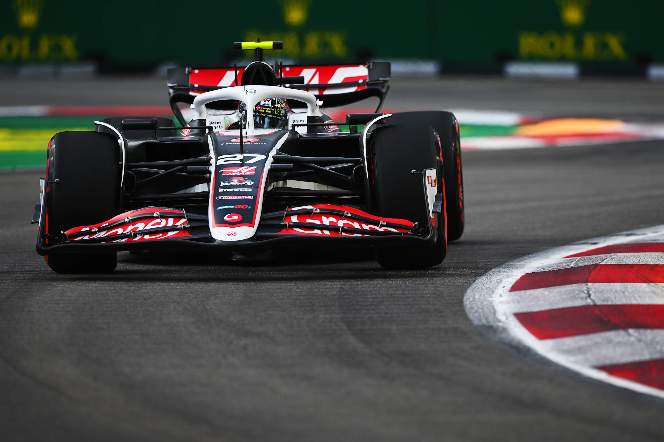 SINGAPORE, SINGAPORE - SEPTEMBER 21: Nico Hulkenberg of Germany driving the (27) Haas F1 VF-24