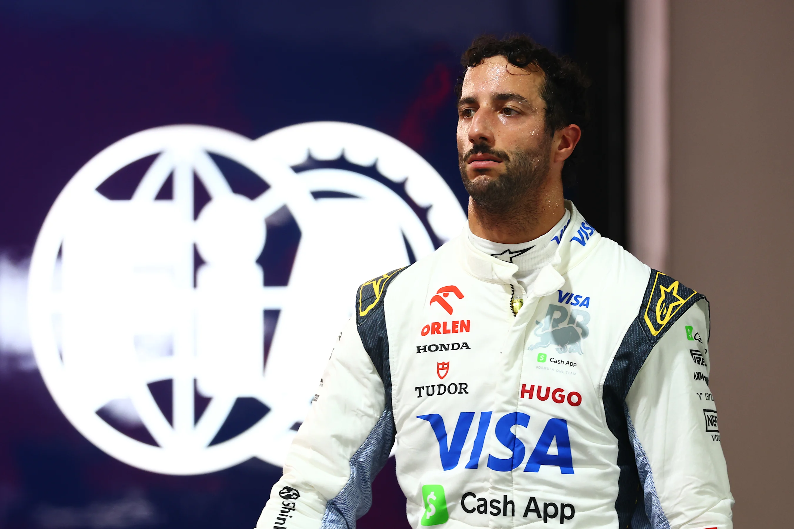 SINGAPORE, SINGAPORE - SEPTEMBER 21: 17th placed qualifier Daniel Ricciardo of Australia and Visa