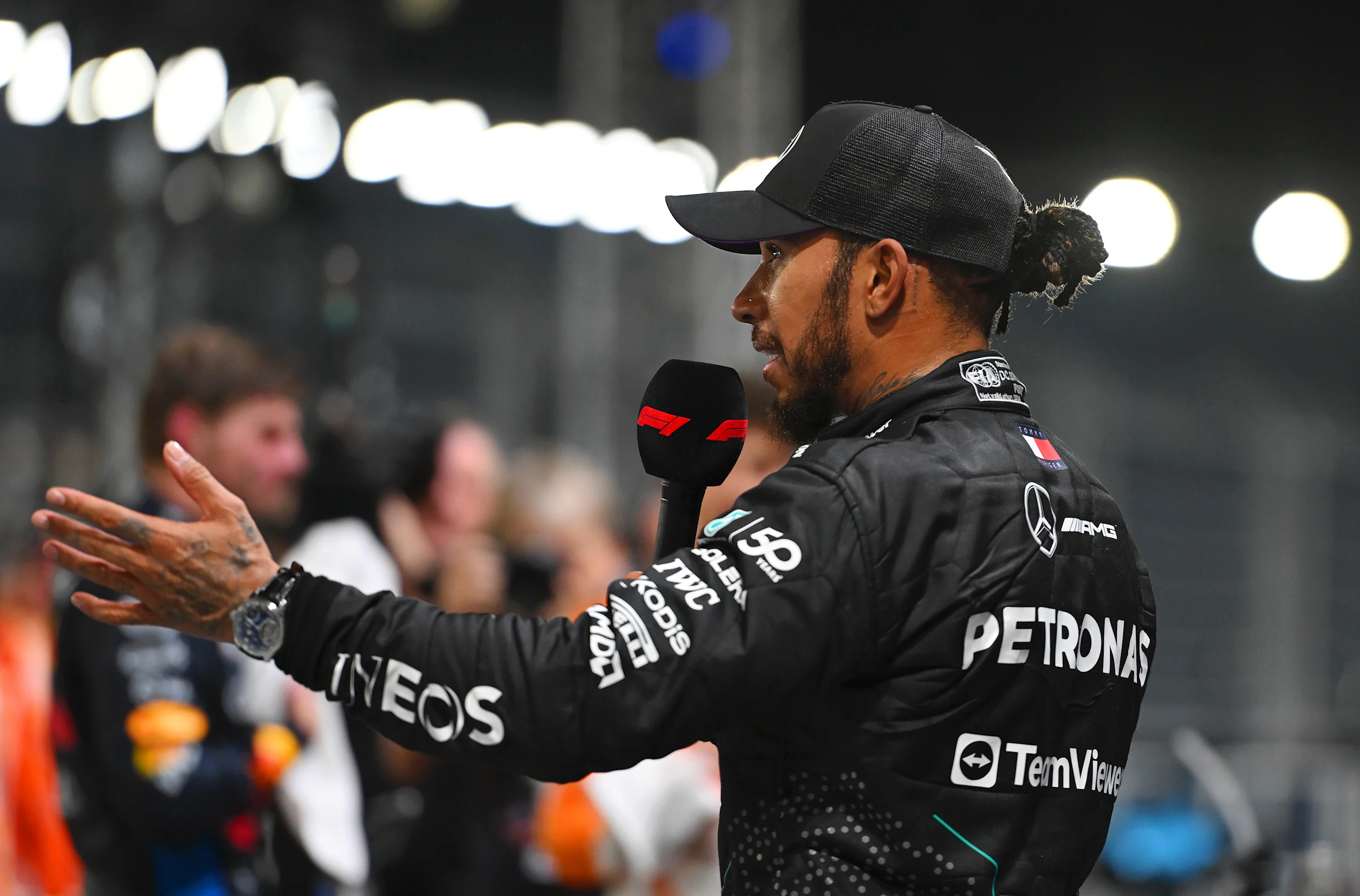 SINGAPORE, SINGAPORE - SEPTEMBER 21: Third placed qualifier Lewis Hamilton of Great Britain and