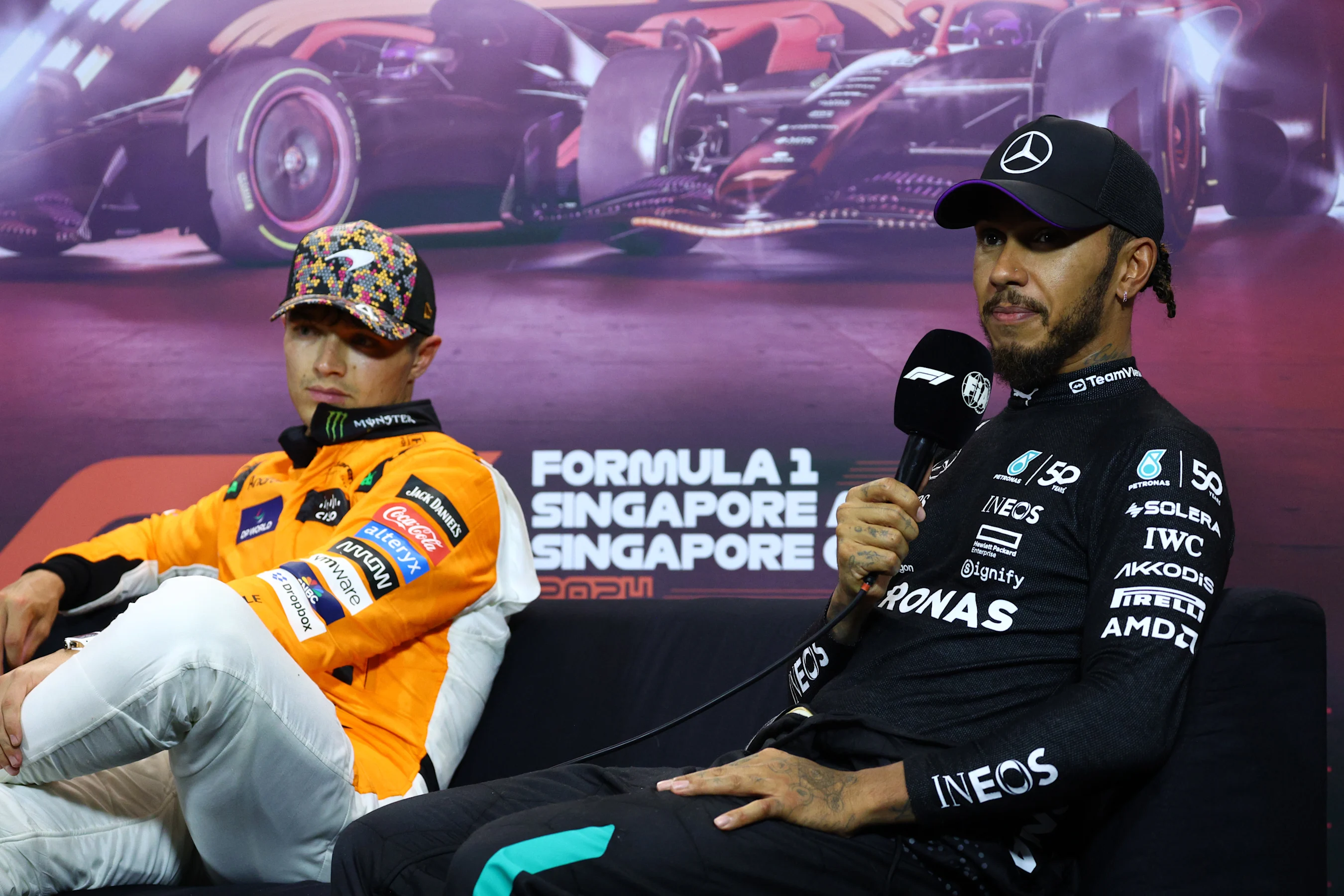 SINGAPORE, SINGAPORE - SEPTEMBER 21: Third placed qualifier Lewis Hamilton of Great Britain and