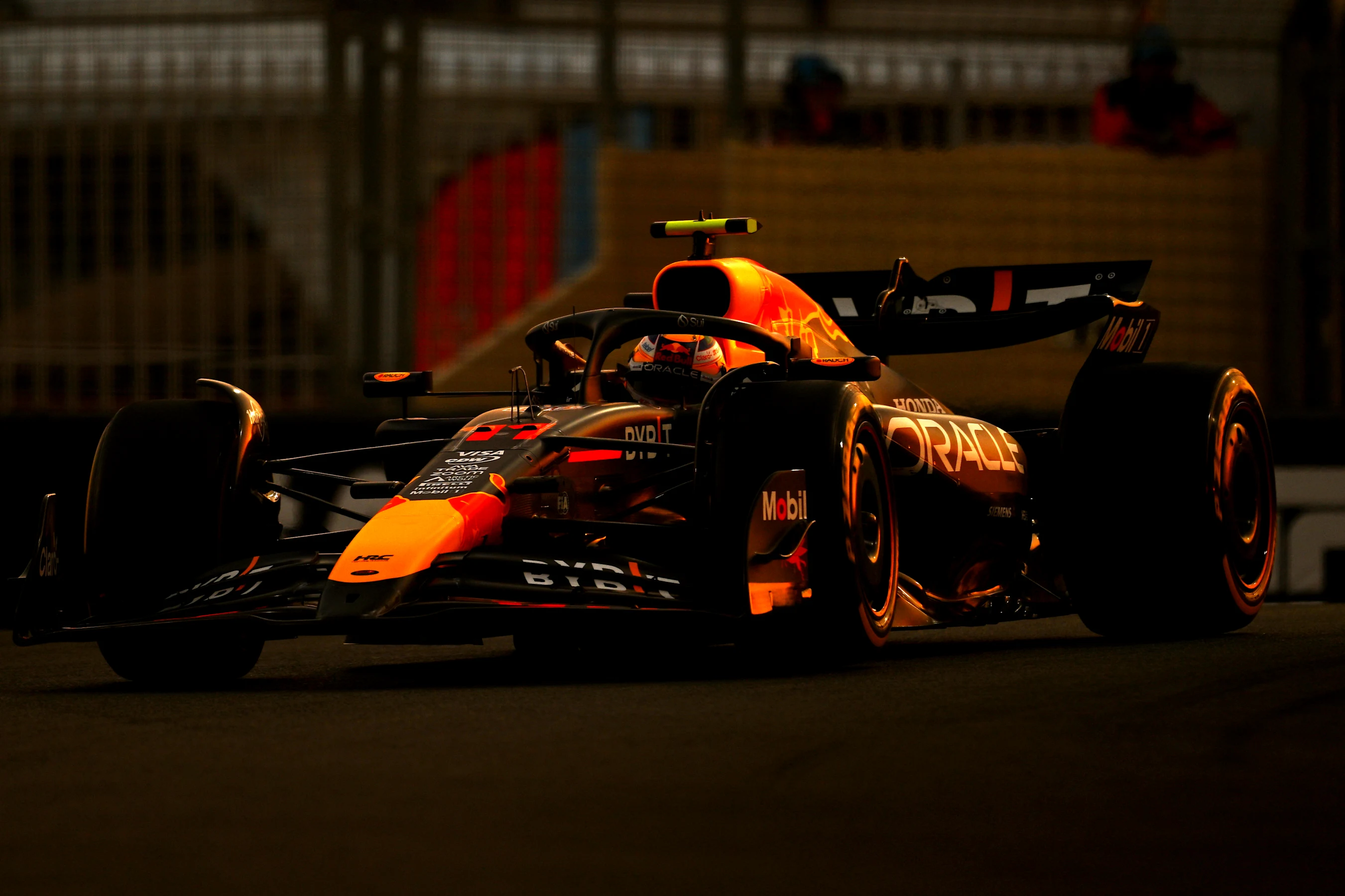 ABU DHABI, UNITED ARAB EMIRATES - DECEMBER 06: Sergio Perez of Mexico driving the (11) Oracle Red
