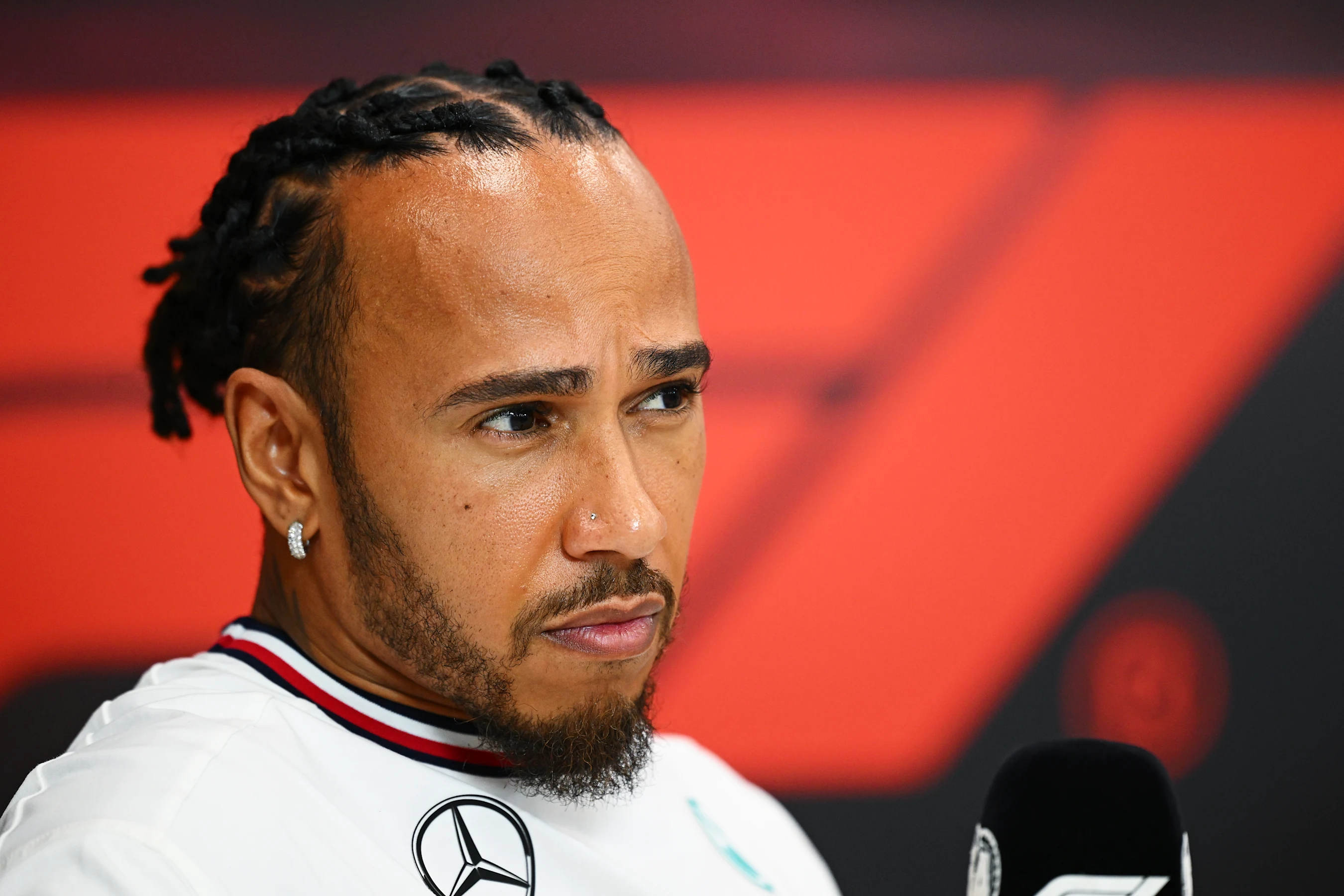 ABU DHABI, UNITED ARAB EMIRATES - DECEMBER 05: Lewis Hamilton of Great Britain and Mercedes attends