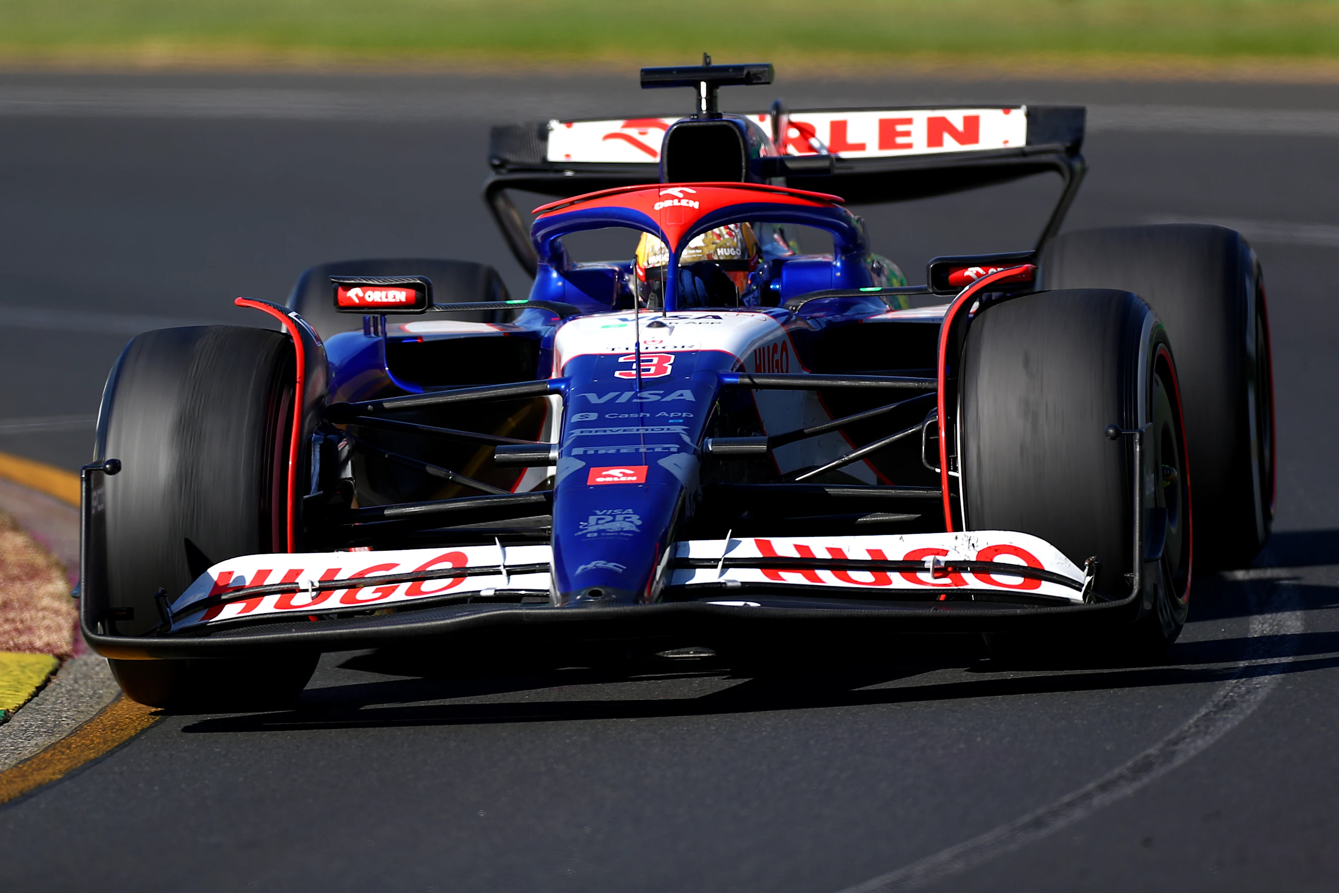 MELBOURNE, AUSTRALIA - MARCH 24: Daniel Ricciardo of Australia driving the (3) Visa Cash App RB