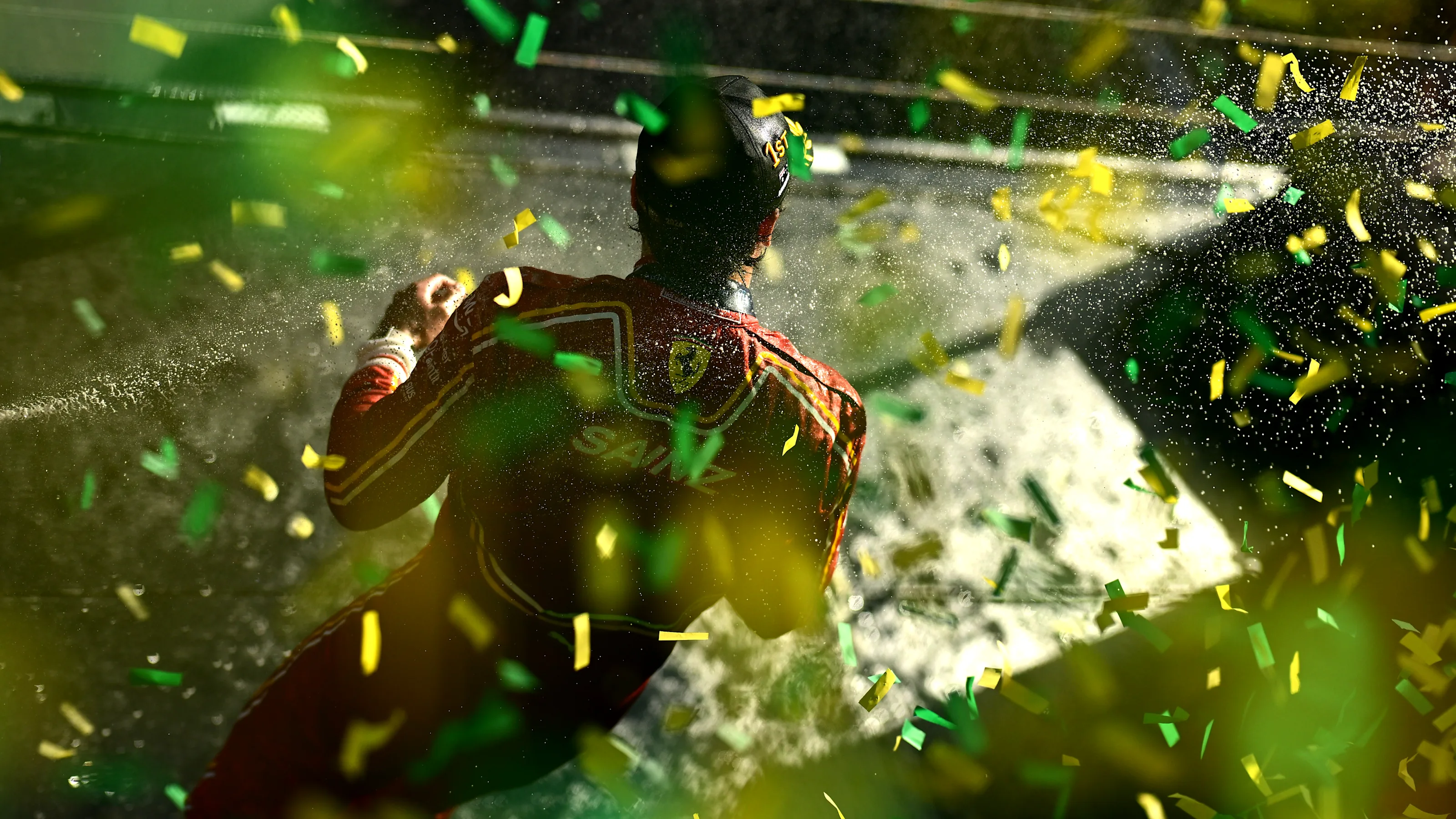MELBOURNE, AUSTRALIA - MARCH 24: Race winner Carlos Sainz of Spain and Ferrari celebrates on the