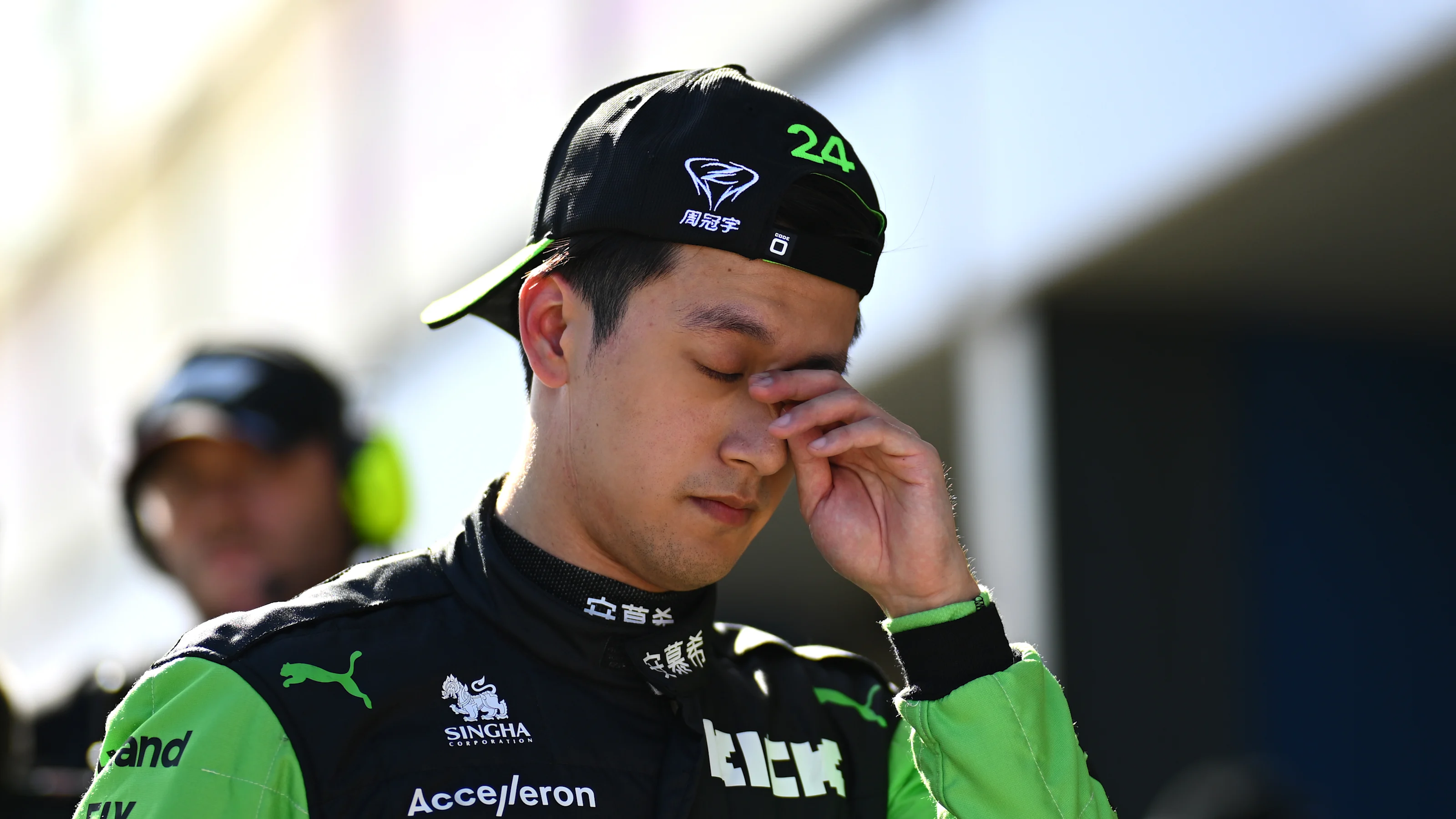 MELBOURNE, AUSTRALIA - MARCH 23: 19th placed qualifier Zhou Guanyu of China and Stake F1 Team Kick