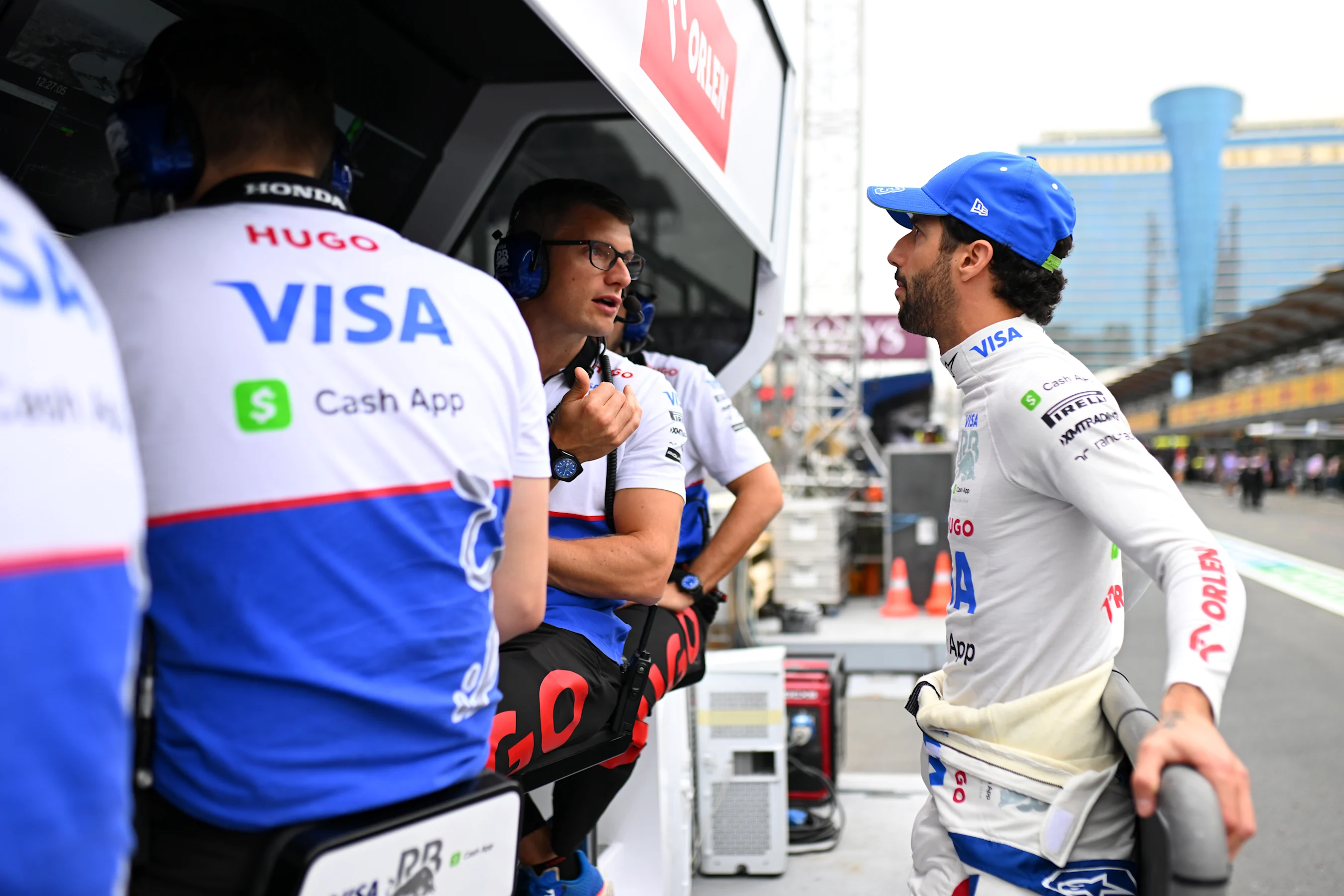 BAKU, AZERBAIJAN - SEPTEMBER 14: Daniel Ricciardo of Australia and Visa Cash App RB talks with race
