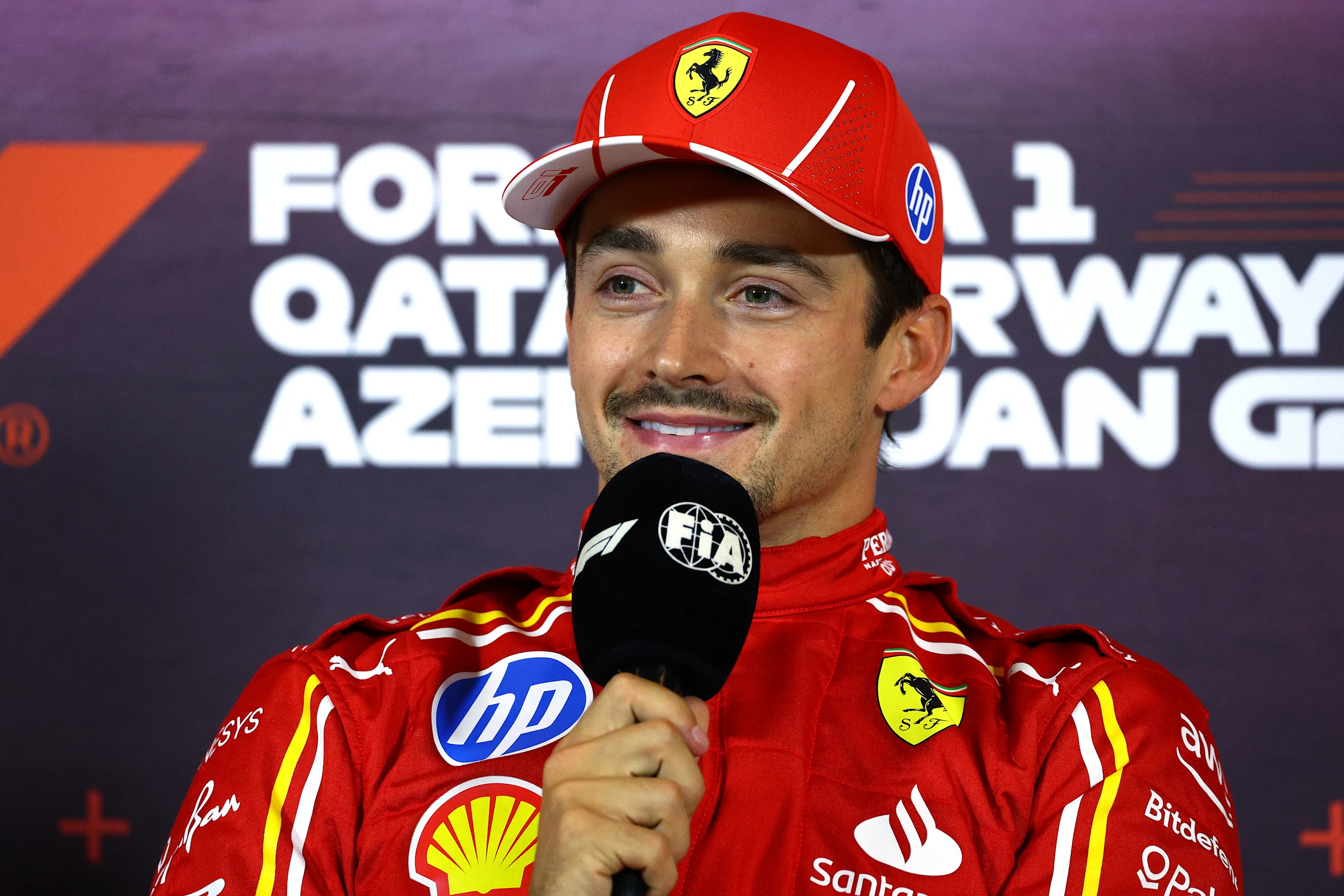 BAKU, AZERBAIJAN - SEPTEMBER 14: Pole position qualifier Charles Leclerc of Monaco and Ferrari