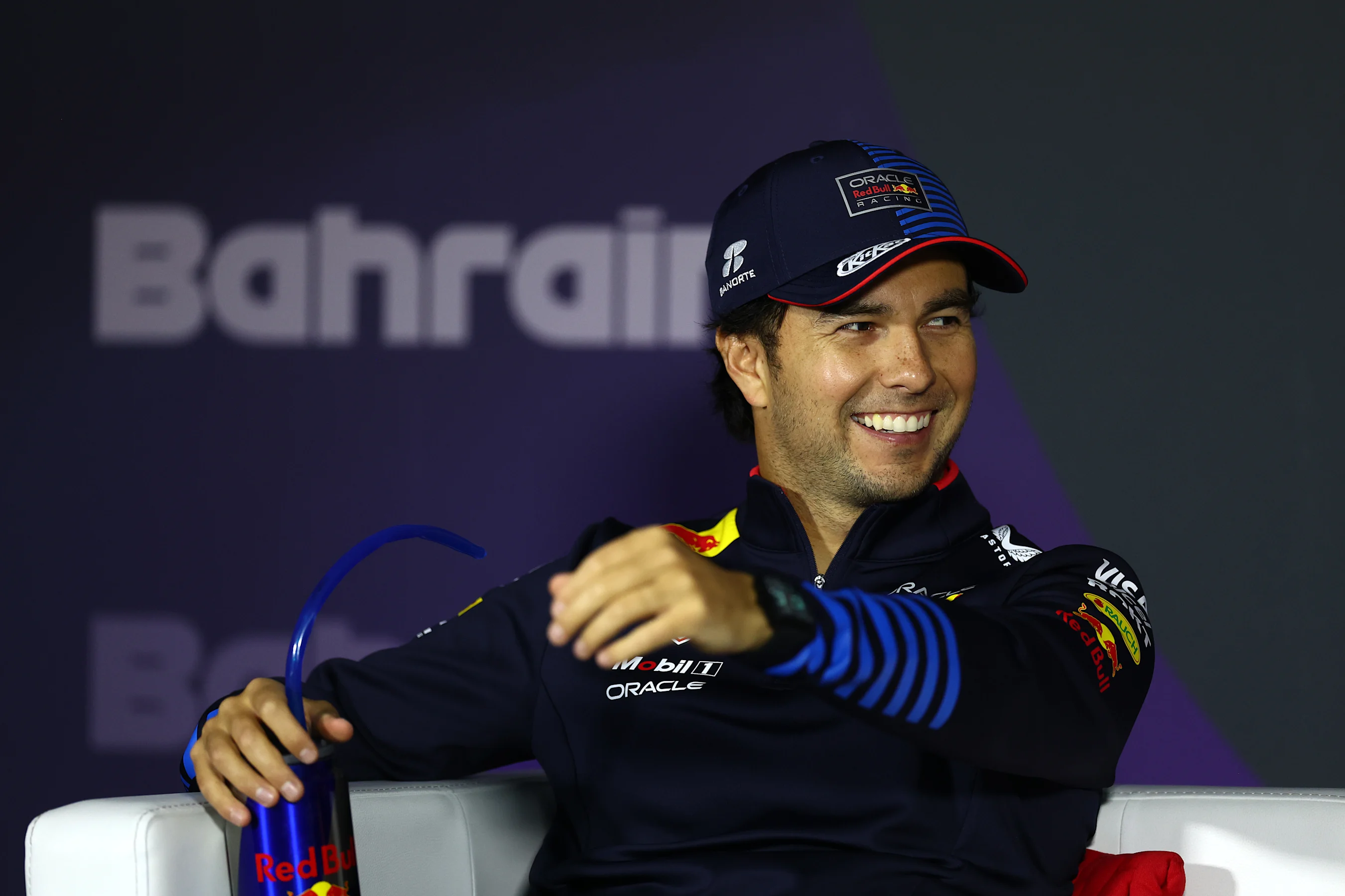 BAHRAIN, BAHRAIN - MARCH 02: Second placed Sergio Perez of Mexico and Oracle Red Bull Racing reacts