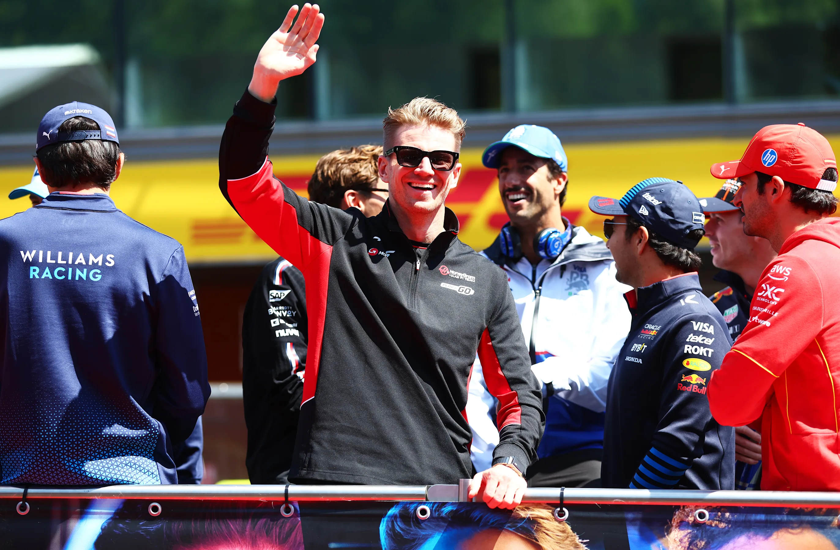 SPA, BELGIUM - JULY 28: Nico Hulkenberg of Germany and Haas F1 waves from the drivers parade prior