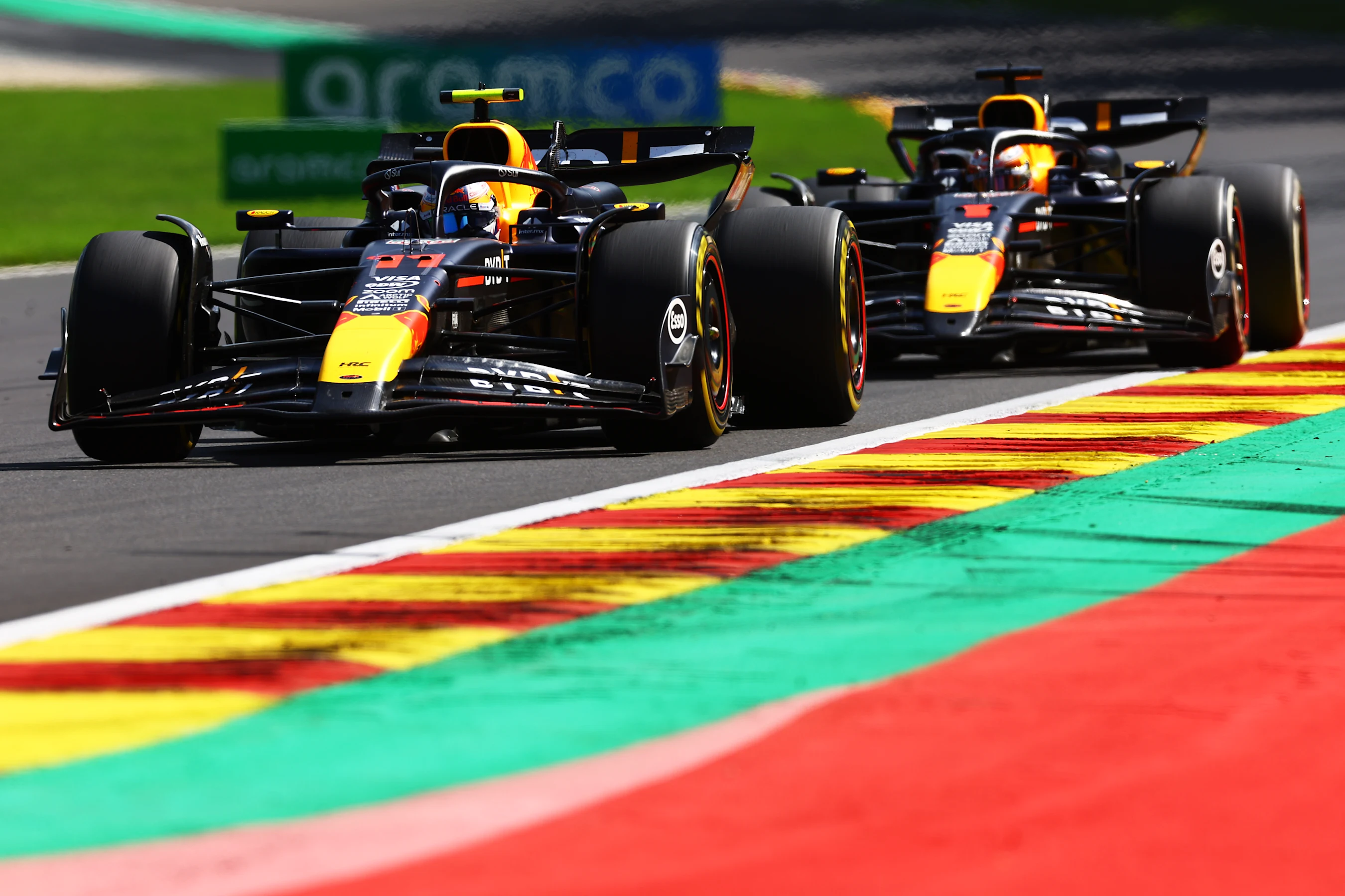 SPA, BELGIUM - JULY 28: Sergio Perez of Mexico driving the (11) Oracle Red Bull Racing RB20 leads