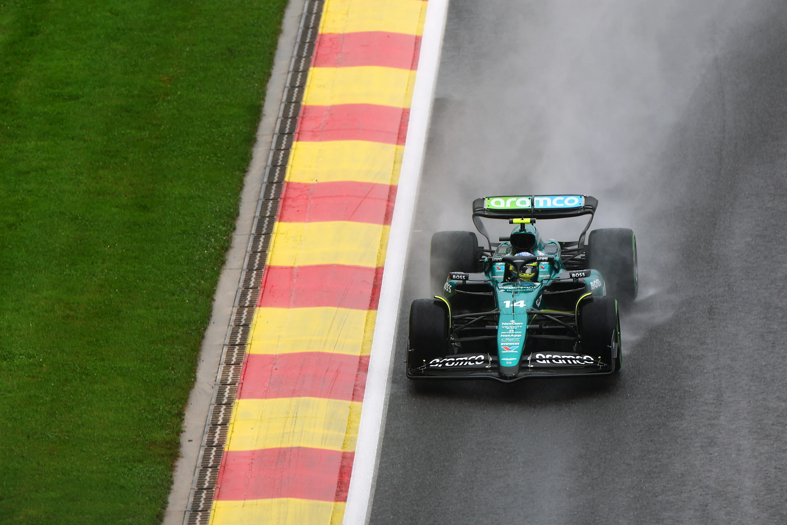 SPA, BELGIUM - JULY 27:  Fernando Alonso of Spain driving the (14) Aston Martin AMR24 Mercedes on