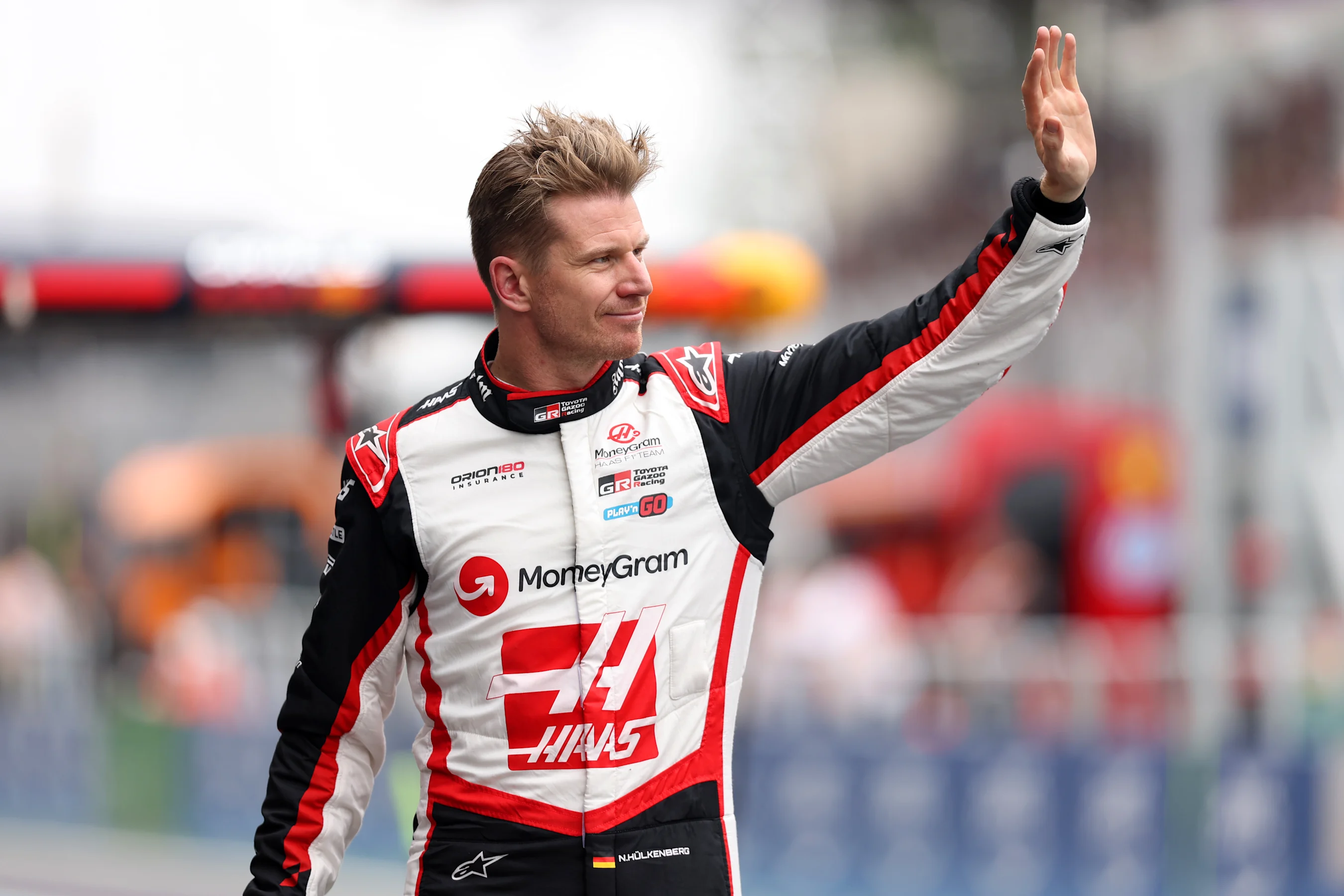 SAO PAULO, BRAZIL - NOVEMBER 01: 12th placed qualifier Nico Hulkenberg of Germany and Haas F1 waves