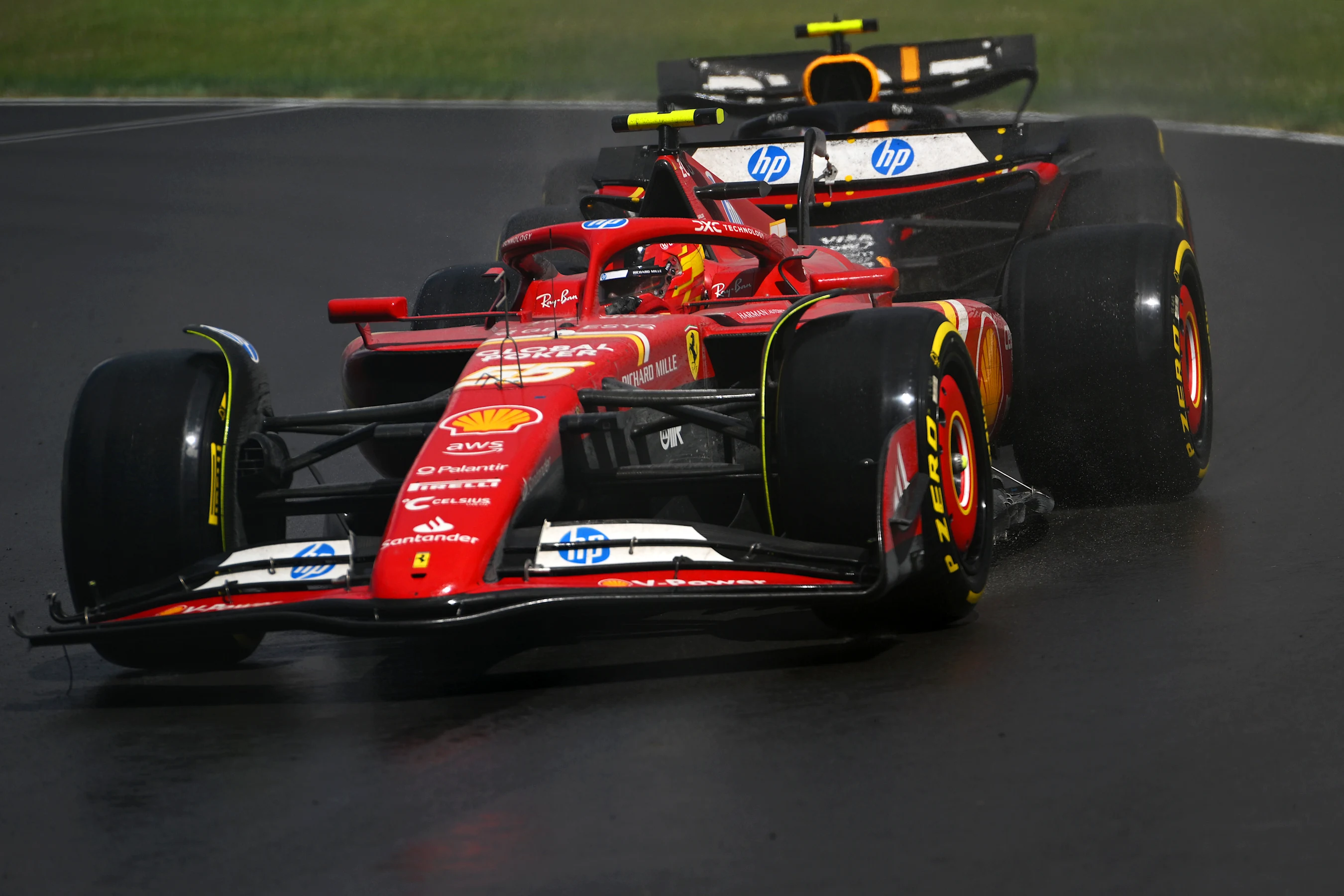 MONTREAL, QUEBEC - JUNE 09: Carlos Sainz of Spain driving (55) the Ferrari SF-24 leads Sergio Perez