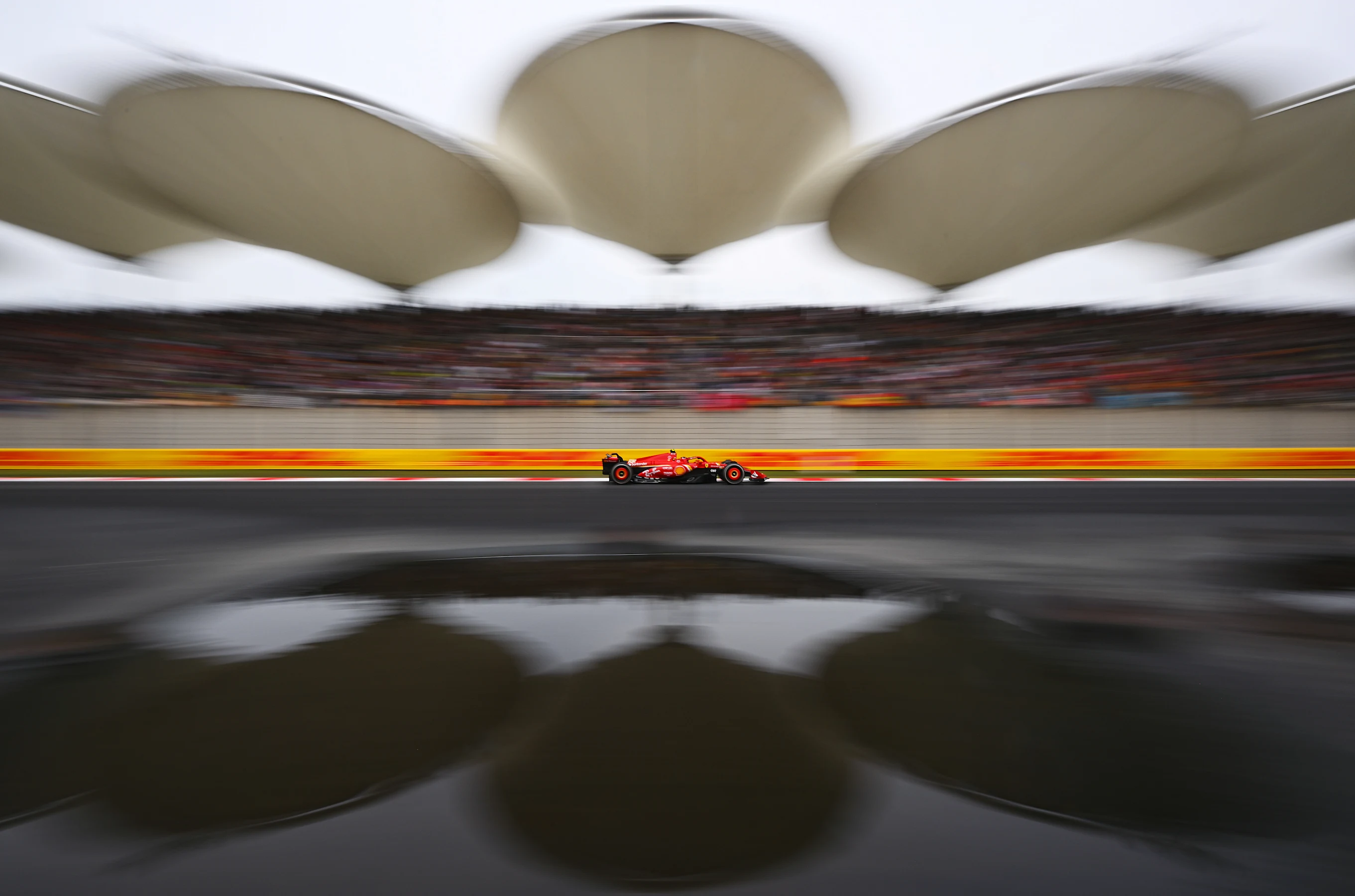 SHANGHAI, CHINA - APRIL 21: Carlos Sainz of Spain driving (55) the Ferrari SF-24 on track during