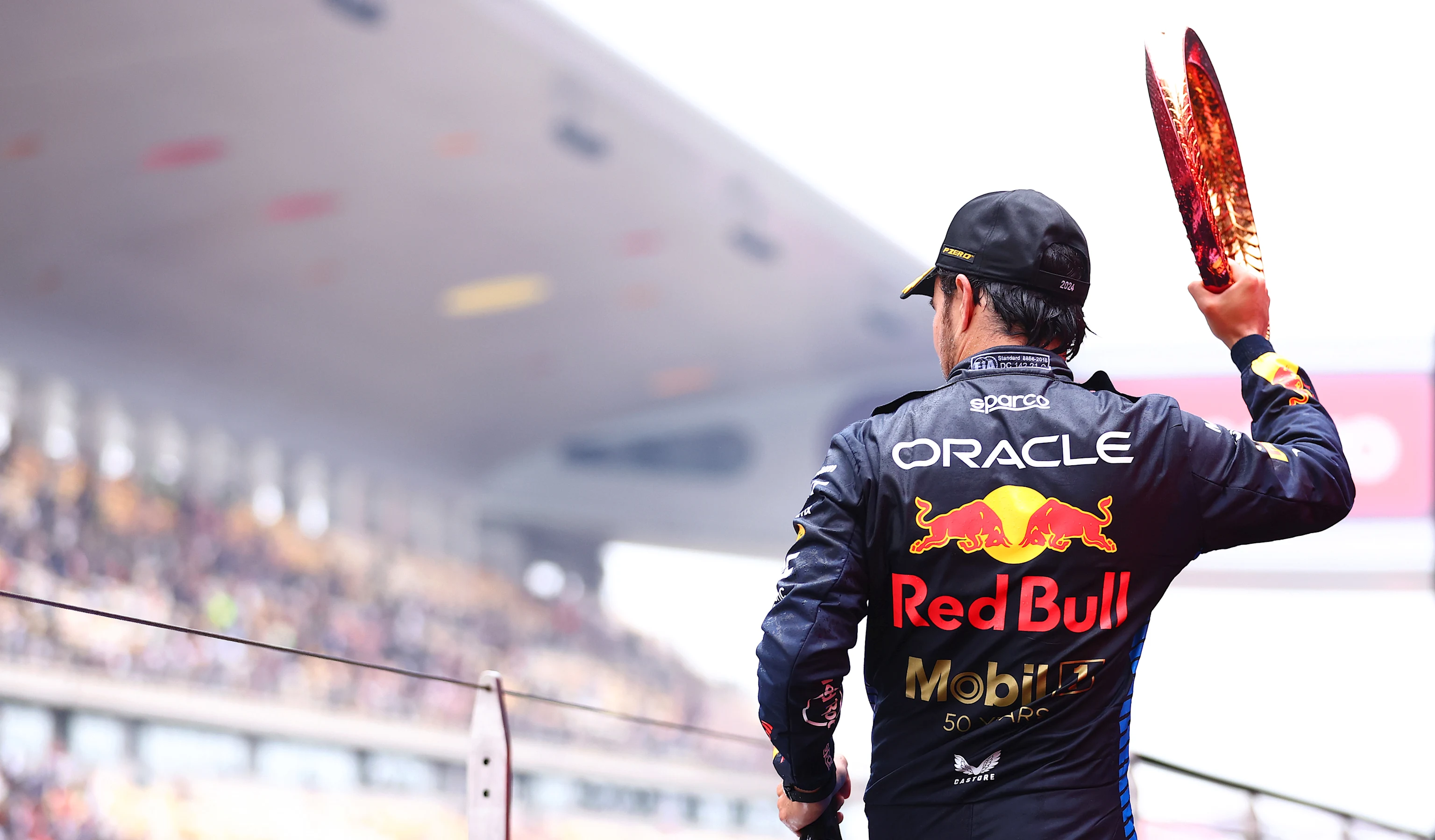 SHANGHAI, CHINA - APRIL 21: Third placed Sergio Perez of Mexico and Oracle Red Bull Racing